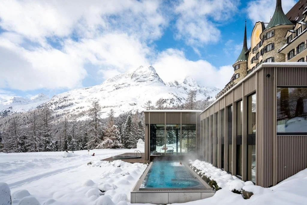 suvretta house exterior pool in st. moritz switzerland