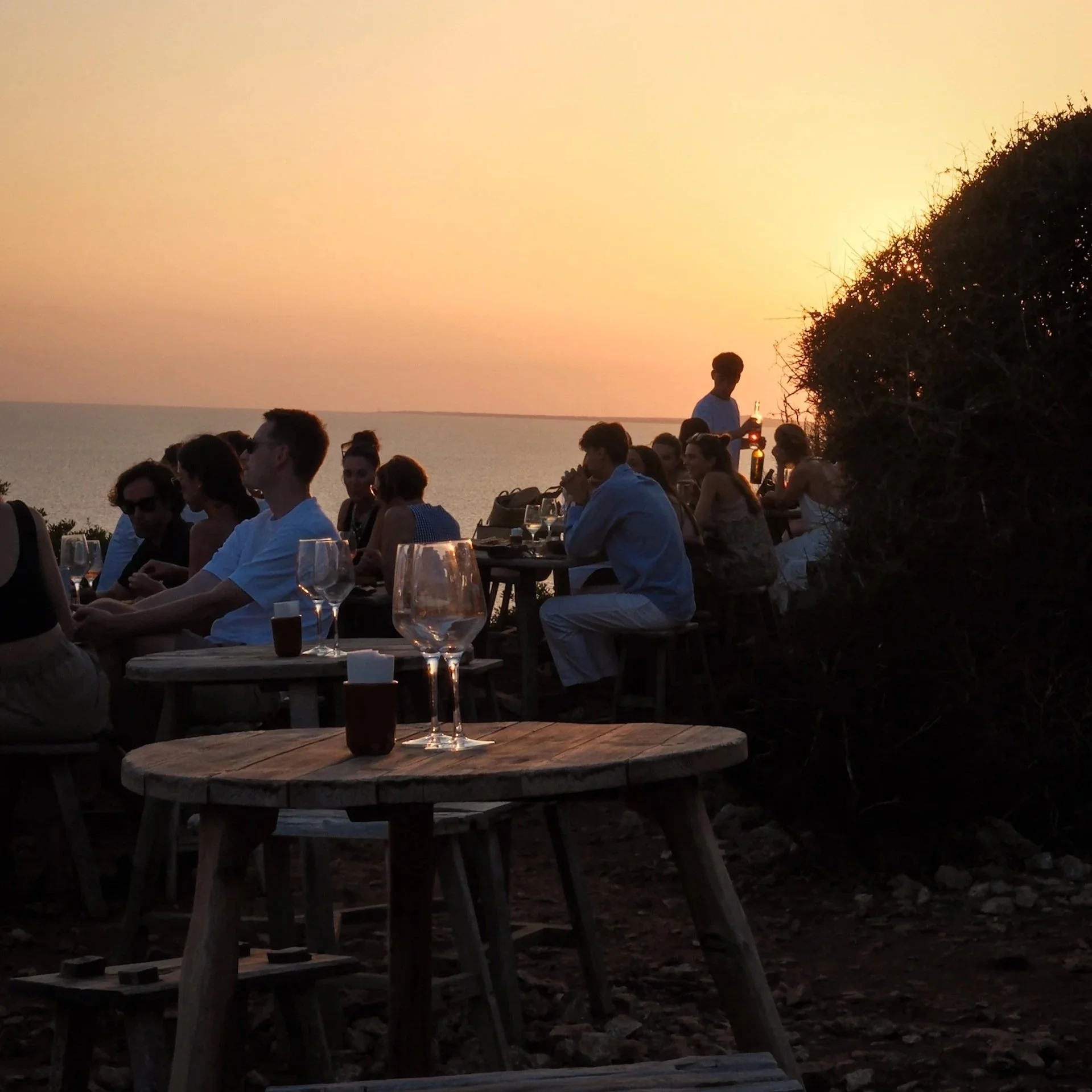 cliffside apertivo at torre vella fonteinelle with sunset