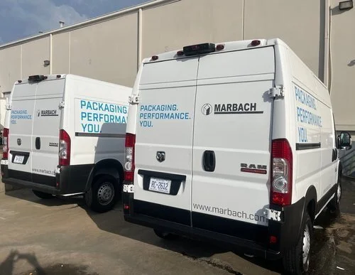 Van fleet vinyl graphics for Marbach installed on-site in Pineville NC