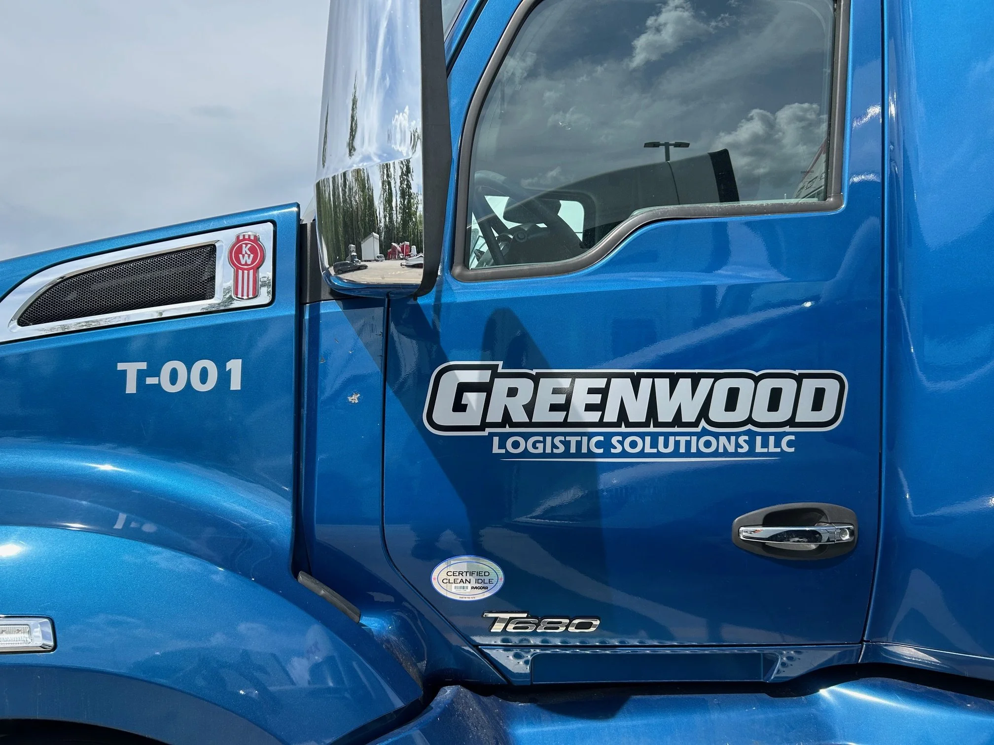 Commercial freight truck with custom vinyl graphics installed in Pineville, NC