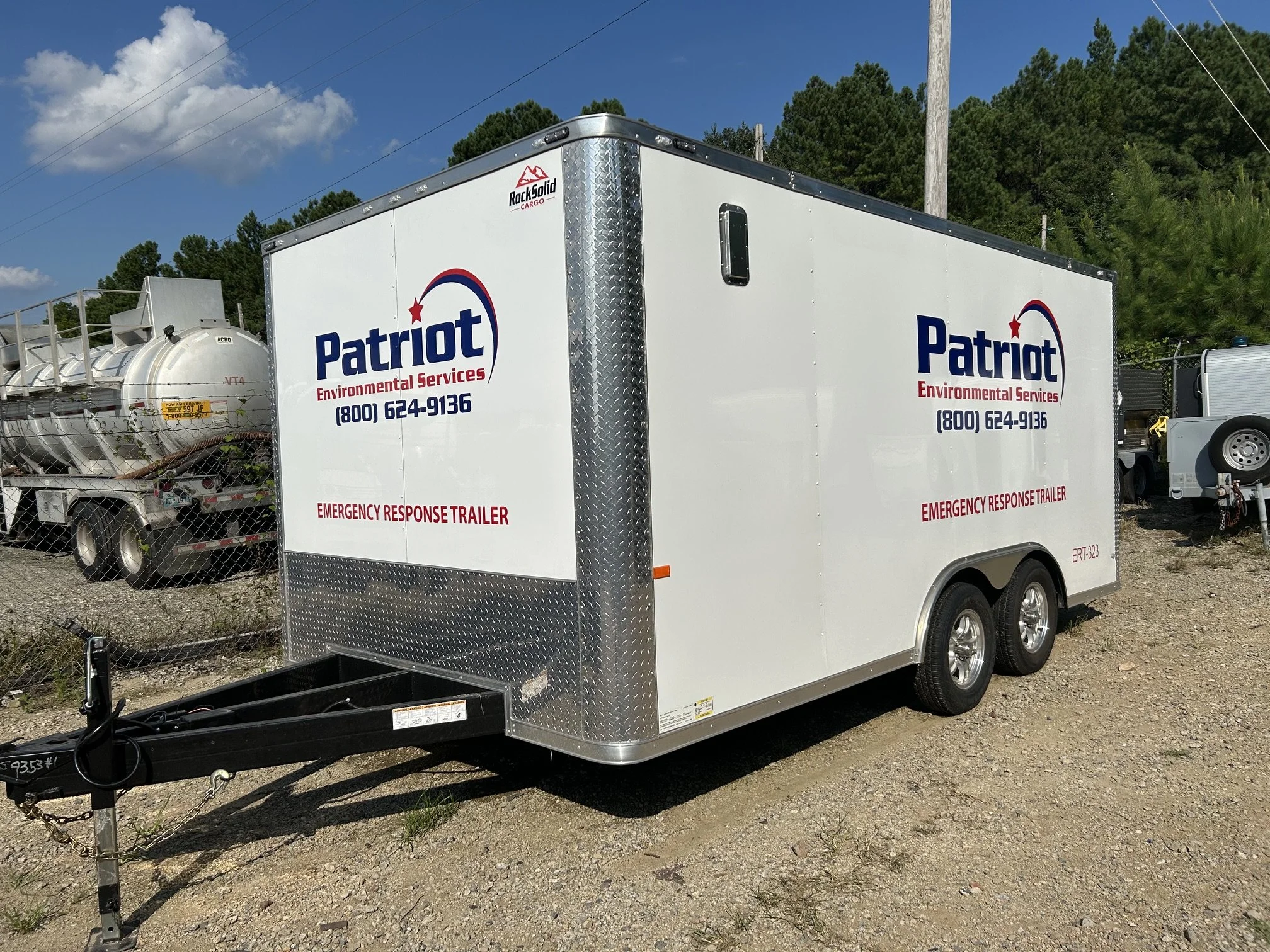 Enclosed trailer with custom vinyl graphics installed in Concord, NC
