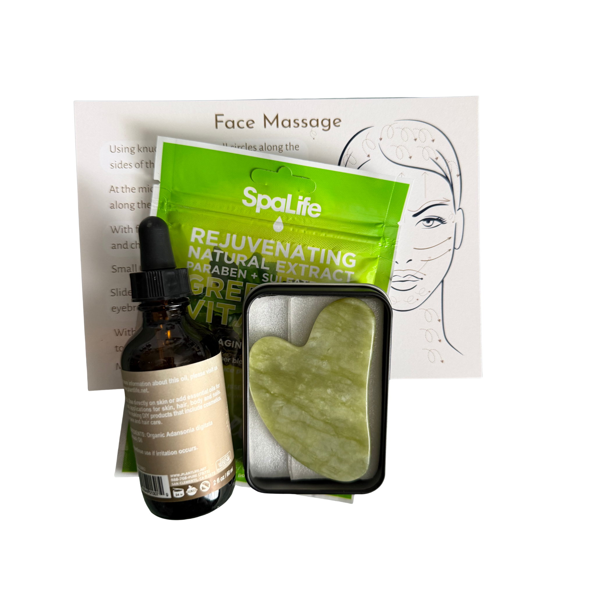 Gua sha facial massage kit with jade stone, face oil dropper bottle, and skincare instruction cards