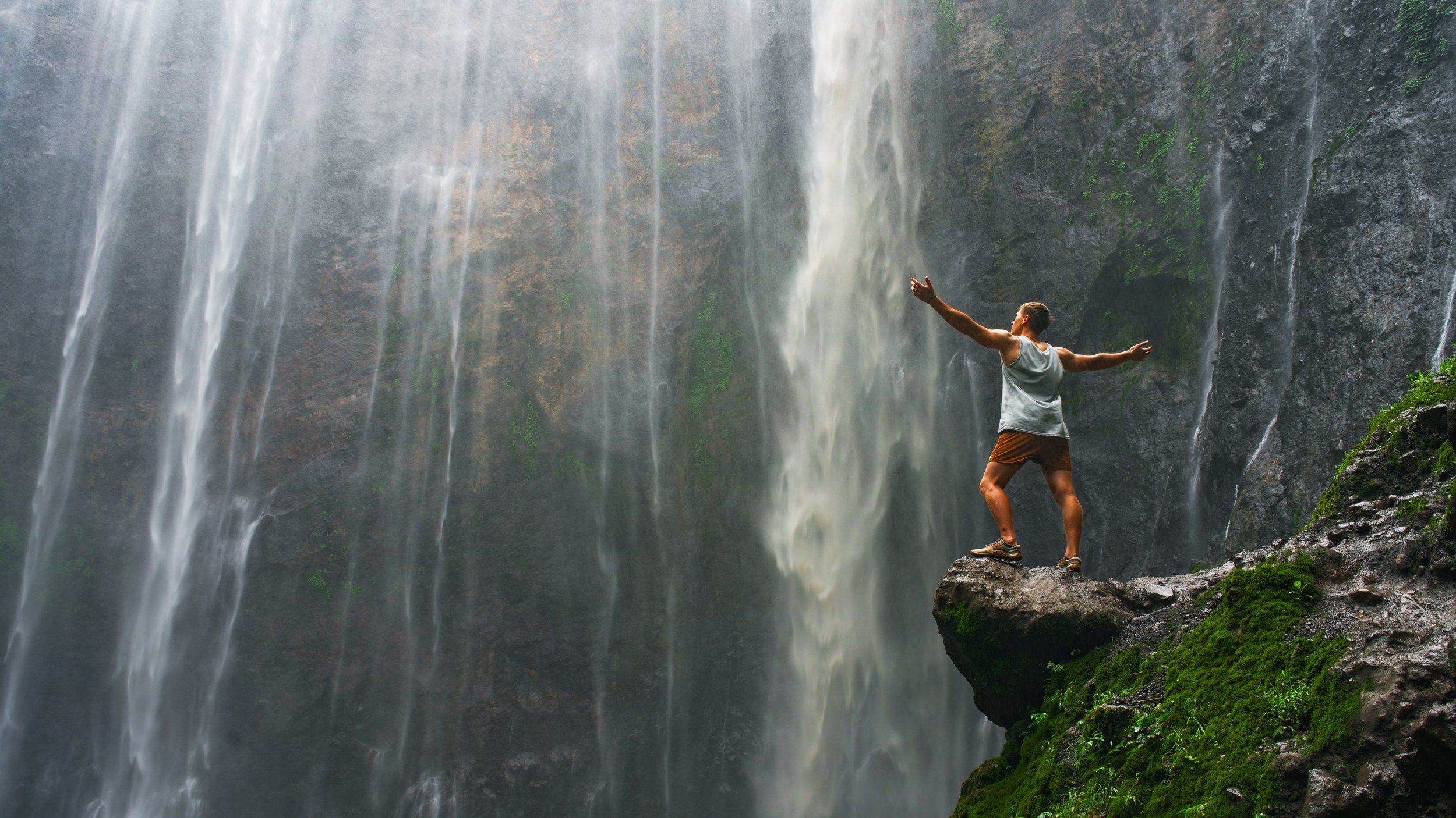 Taking a moment to take in the waterfall from the base