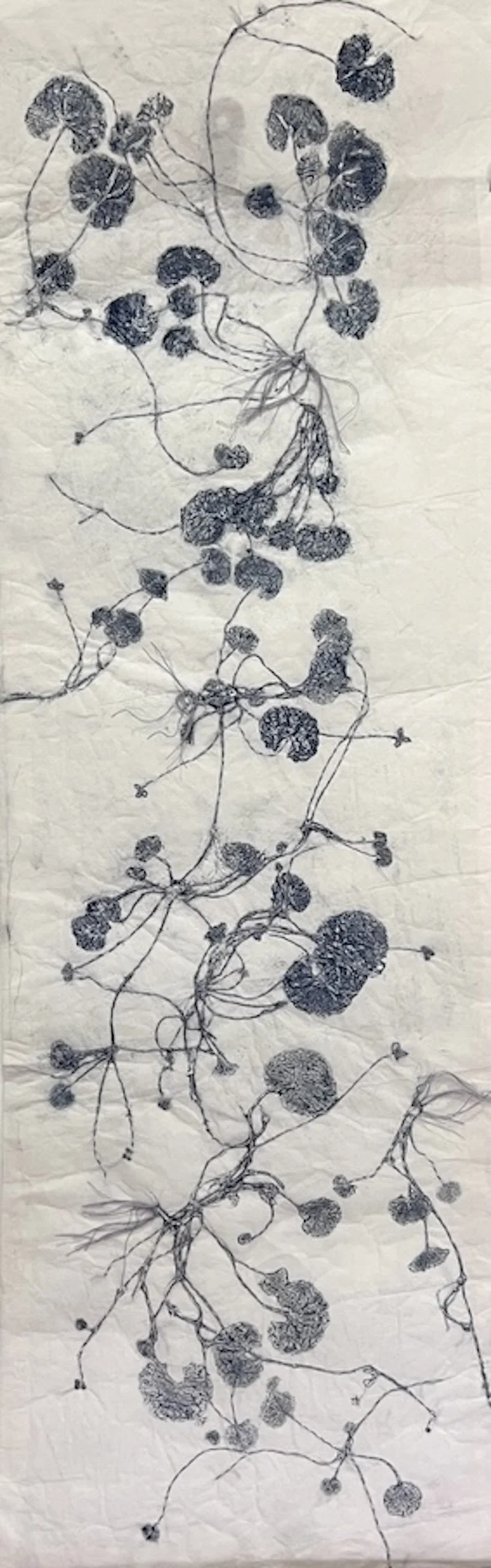 Gathering Quietly 2026 
Monoprint and hand stitching on Wenzhou Pi paper scroll 
Impressions of wild violets accumulate like fragments of memory, their stitched echoes suggesting gentle transformation, continuity, and the unfolding presence of time.
