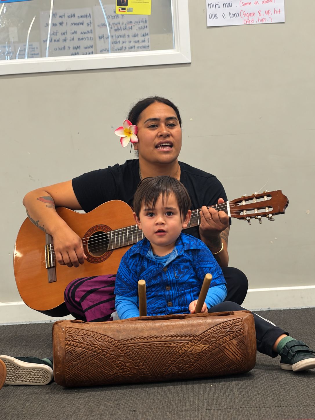 Classroom Music Session with Carved Drum.png