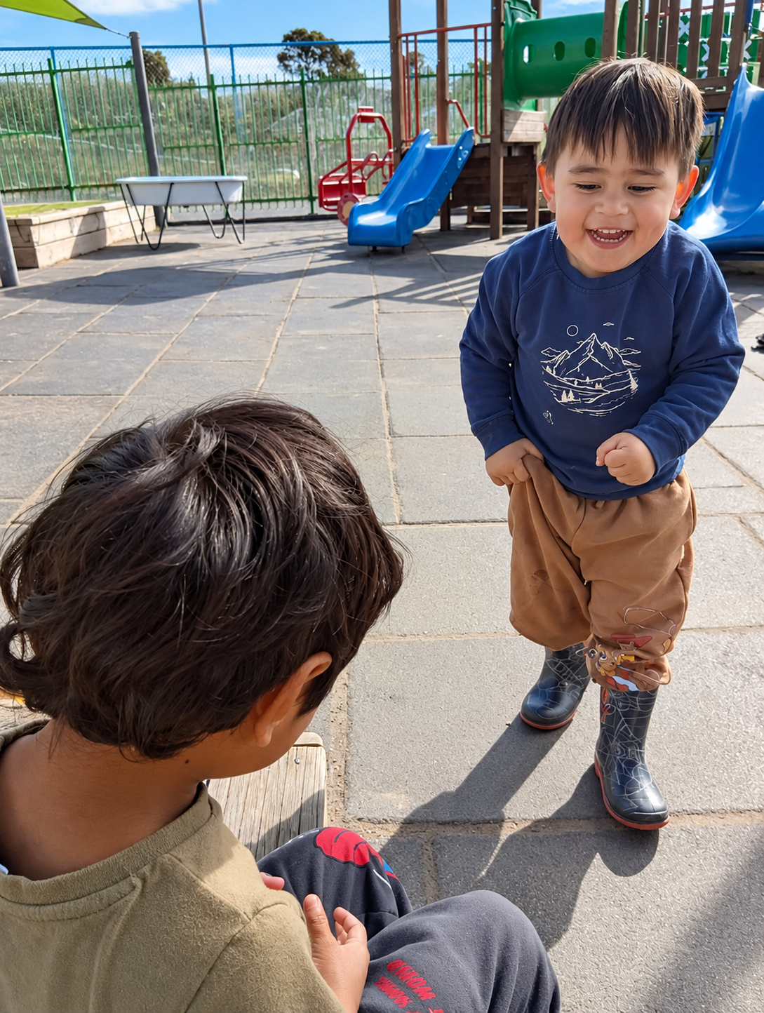 Tamariki playing.png