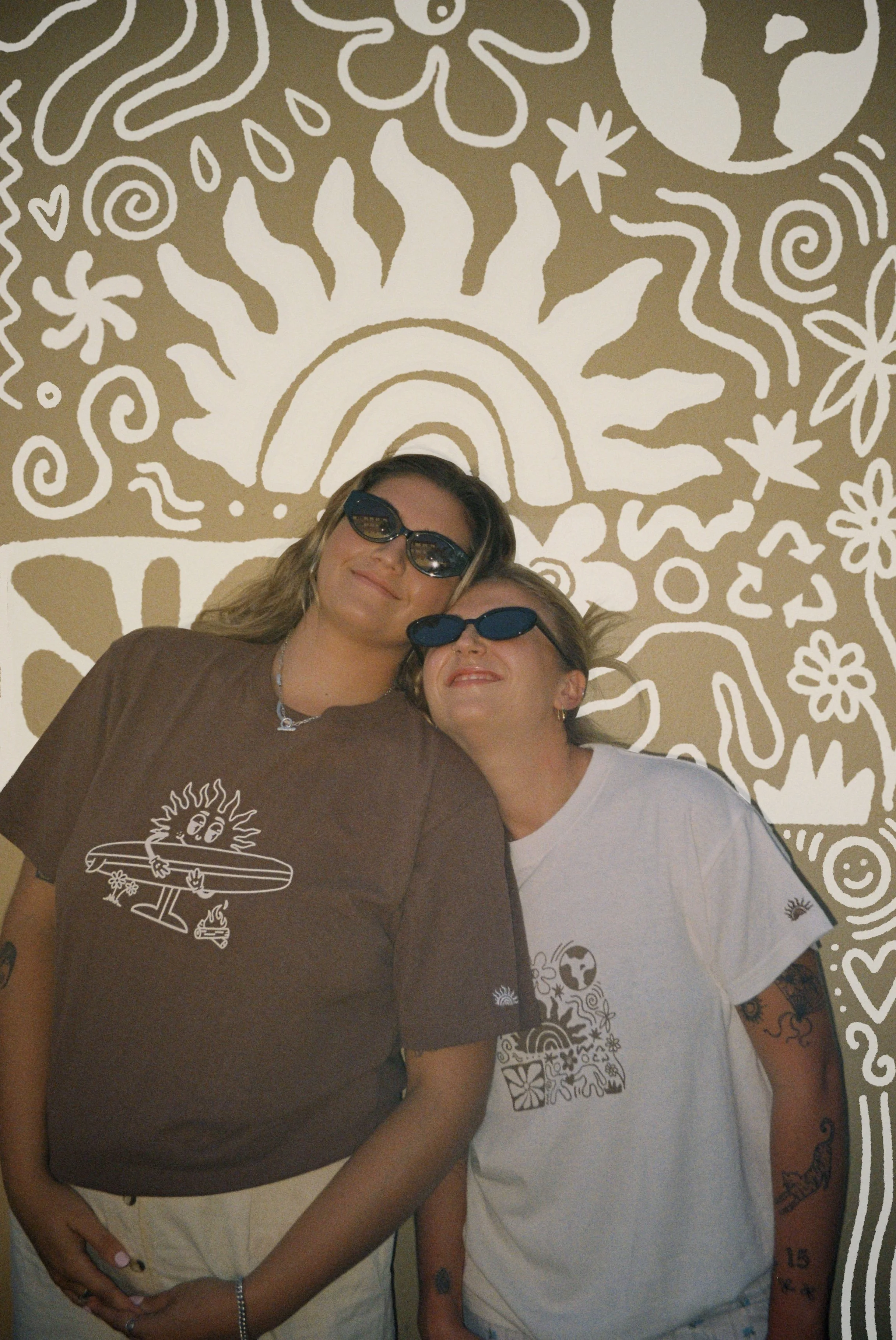 Two girls in Rise Against Division tees