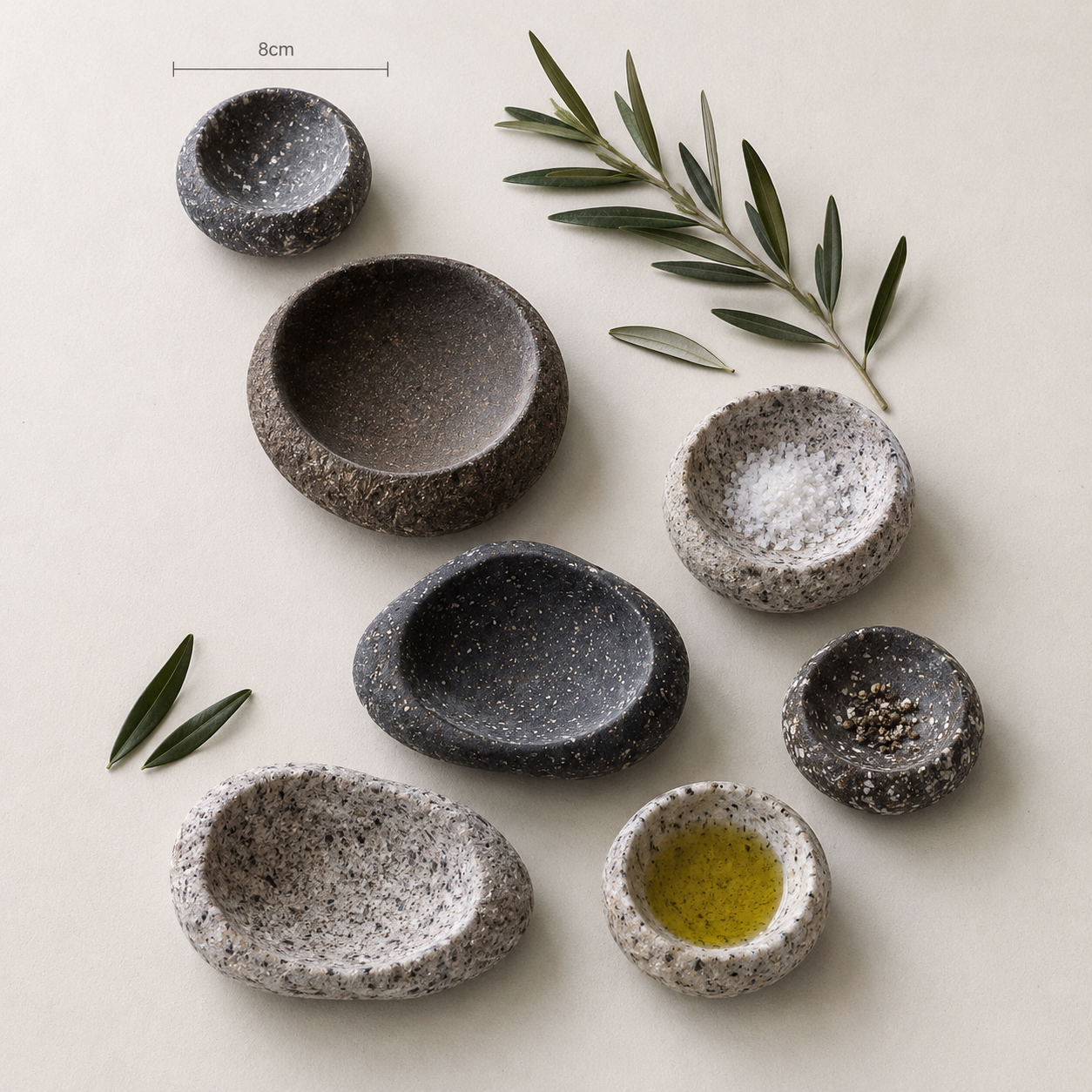 Gather Bowl hand-carved from volcanic stone by New Zealand sculptor Amie Redpath, styled with bread, olive oil and sea salt.