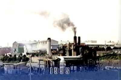 Atsugi incinerator emitting dark smoke in 1995.