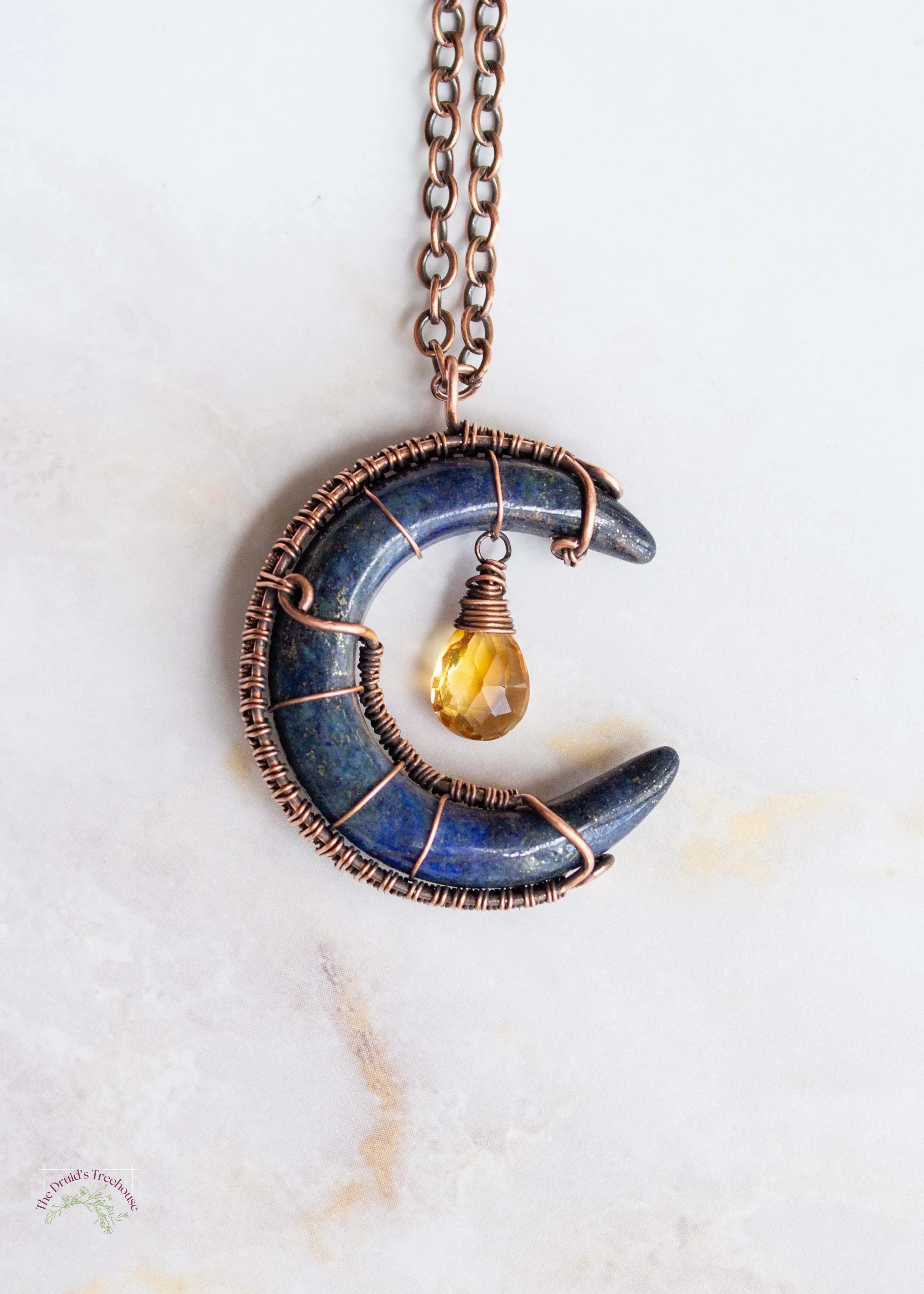 wire-wrapped-lapis-lazuli-crescent-moon-with-citrine-dangle-8046.jpg