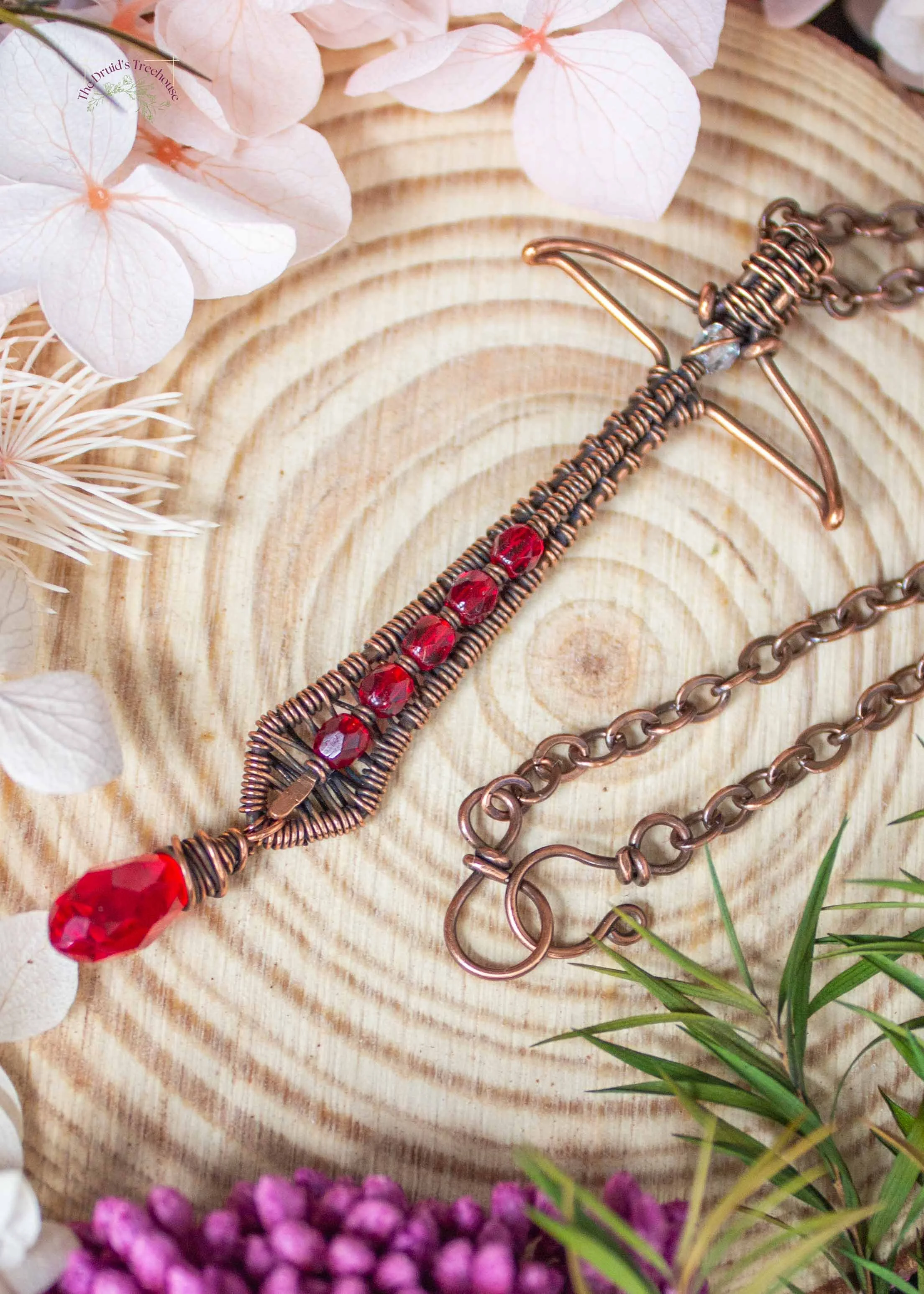 wire-wrapped-sword-pendant-with-red-beads-7245.jpg