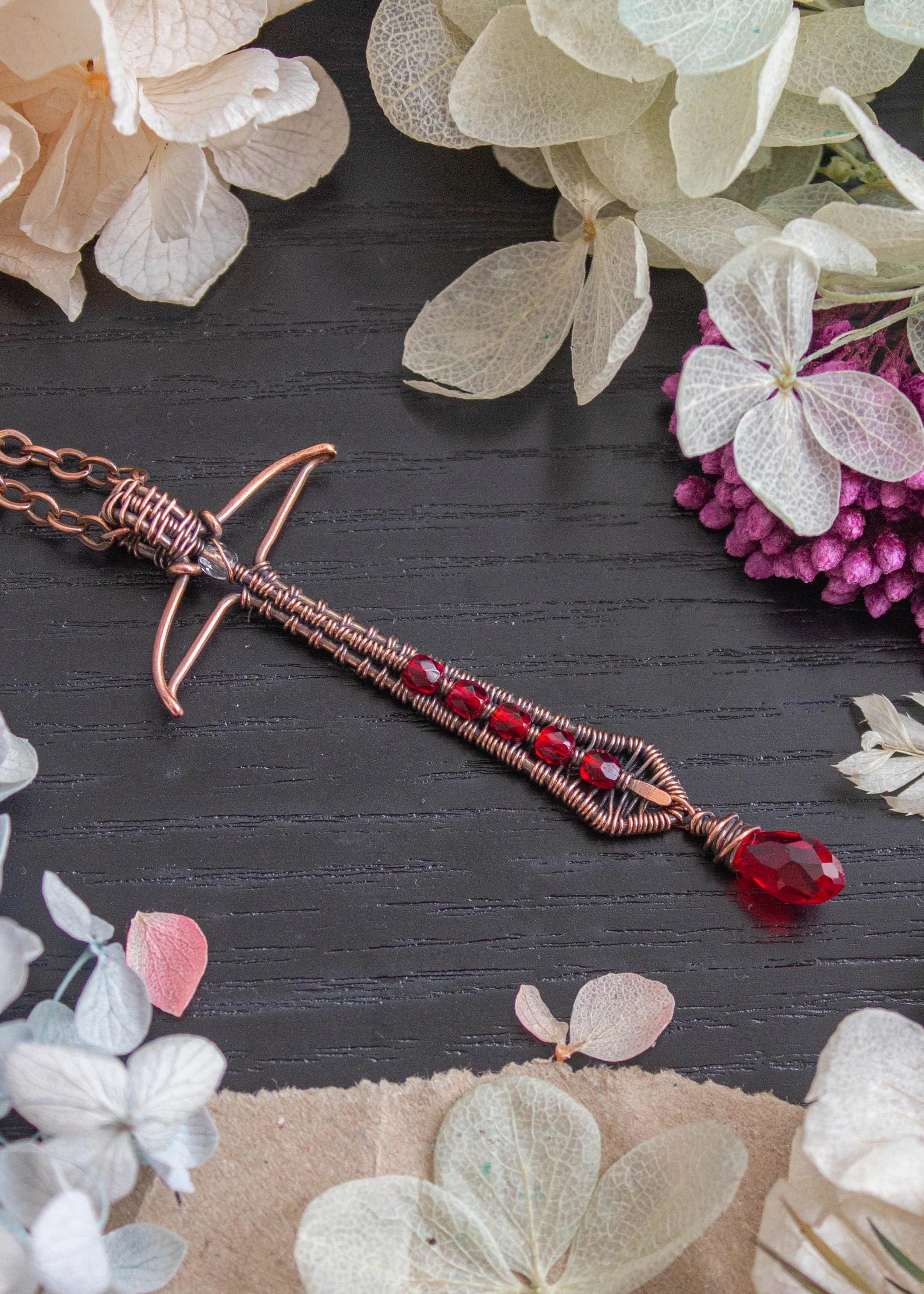 wire-wrapped-sword-pendant-with-red-briolette-5494.jpg