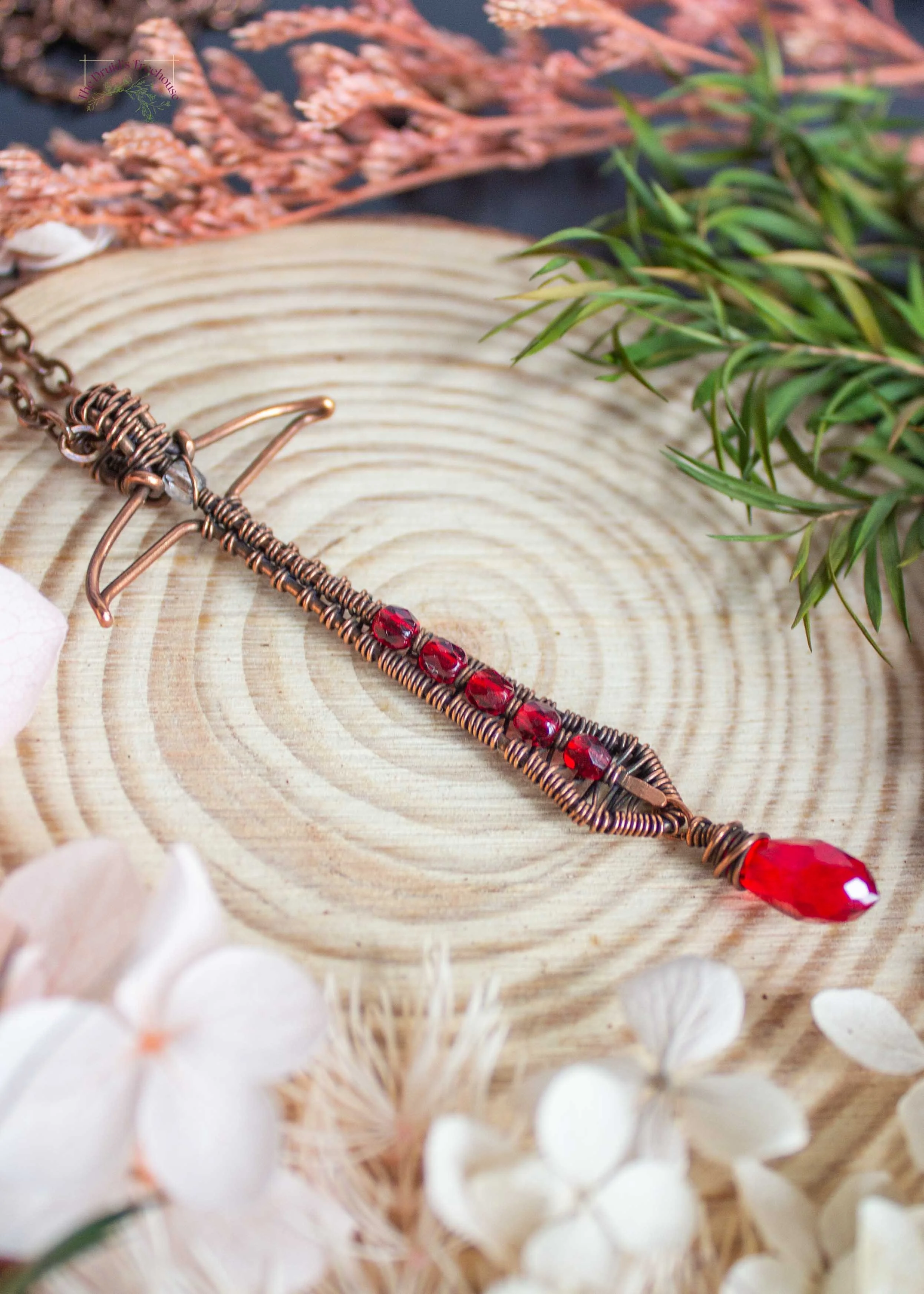 wire-wrapped-sword-pendant-with-red-beads-7242.jpg