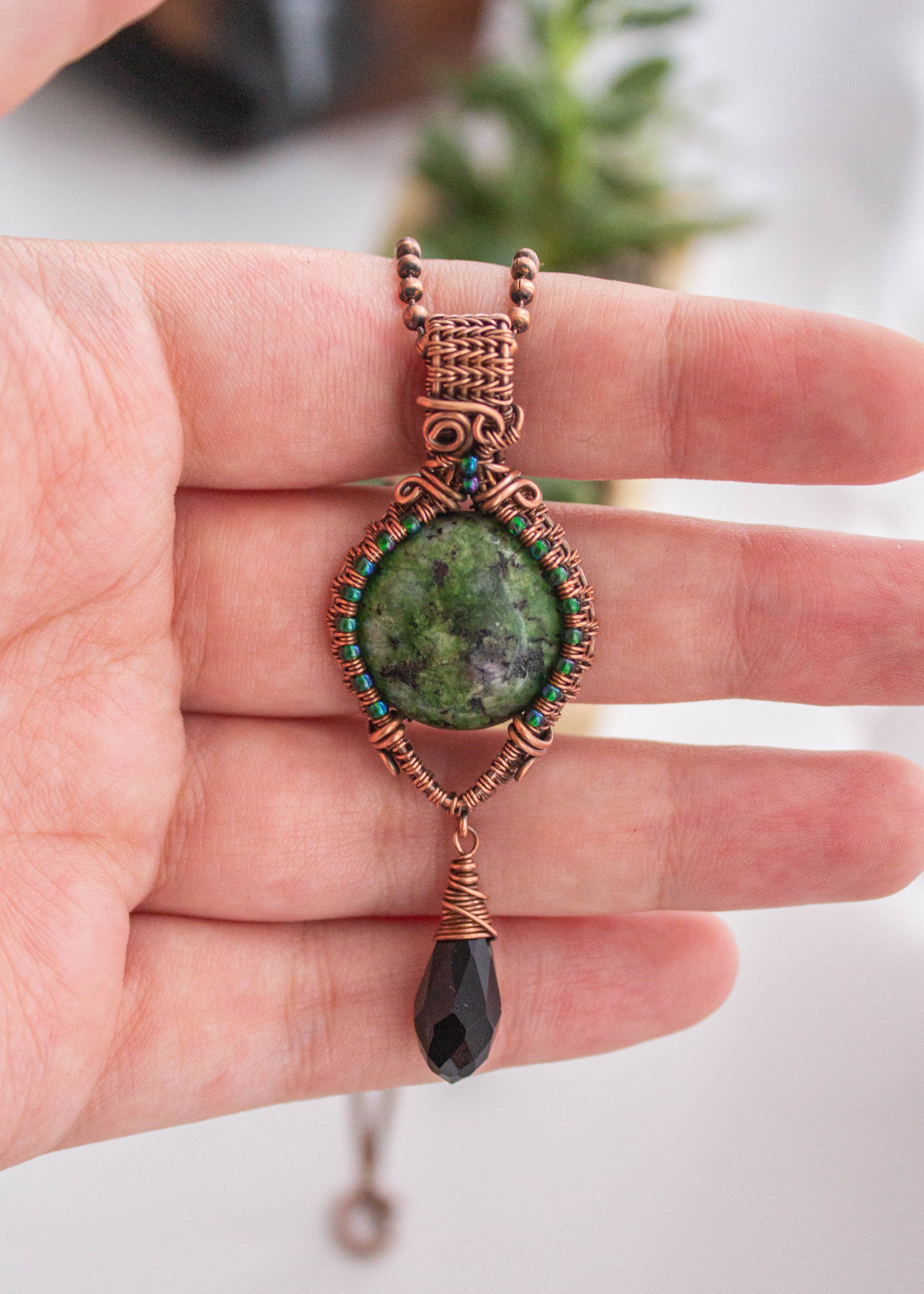 wire-wrapped-zoisite-pendant-4000-min-1.jpg