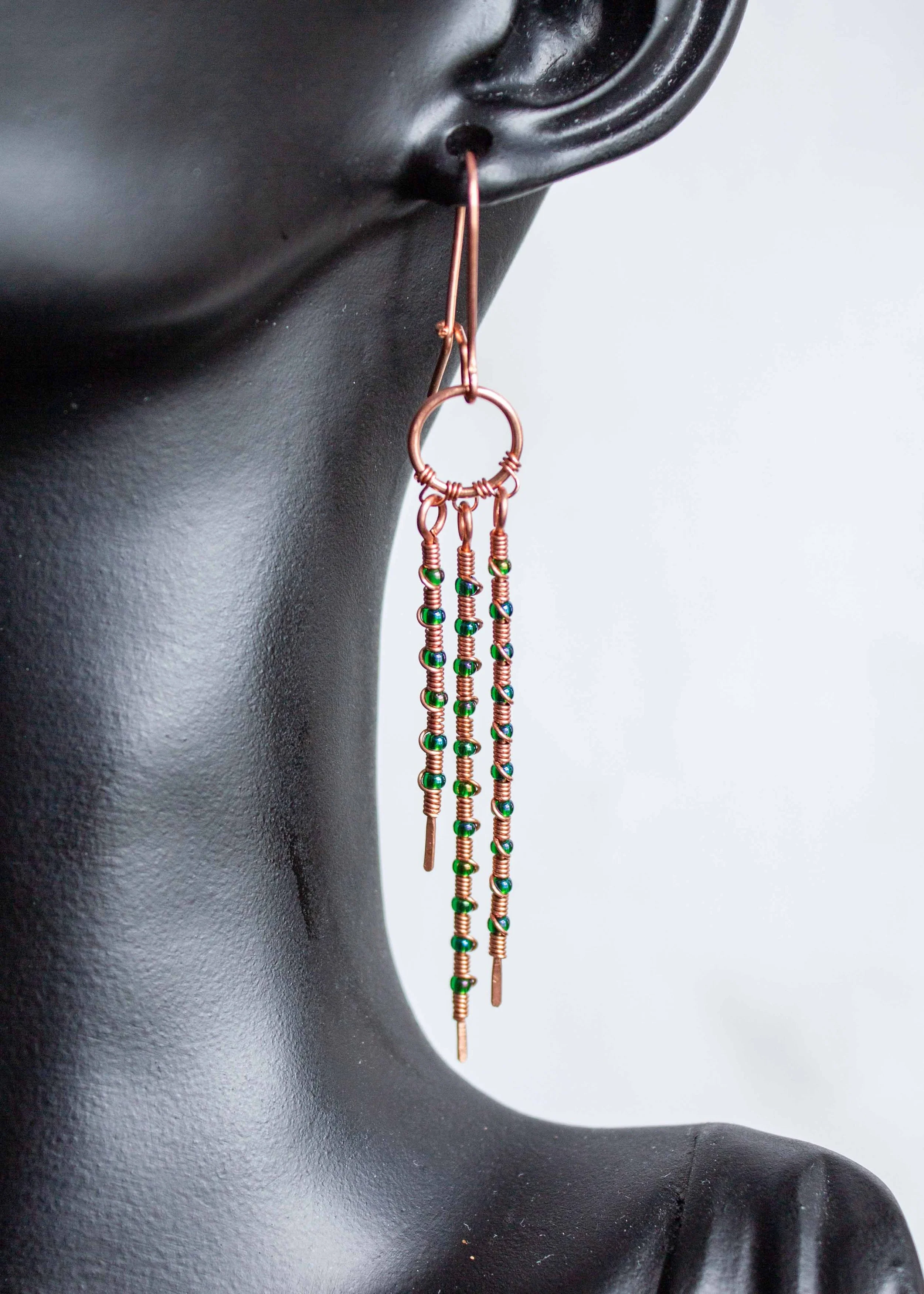 wire-wrapped-copper-earrings-with-green-seed-beads-7571.jpg