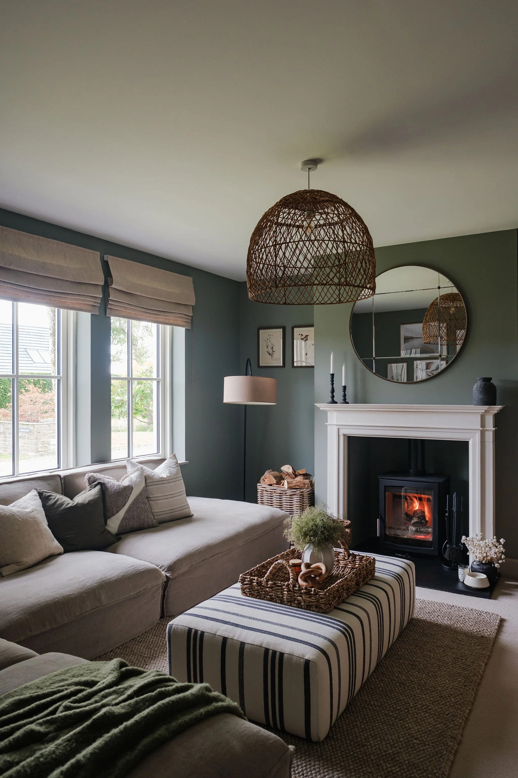 Green country living room with fire