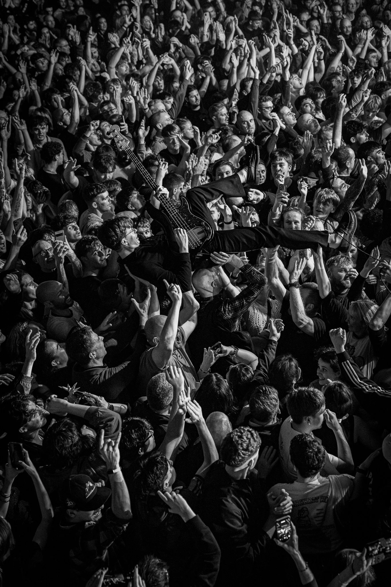 Johnny Fife Crowd surfing with bass guitar. The Clause playing live 2025 at O2 Birmingham