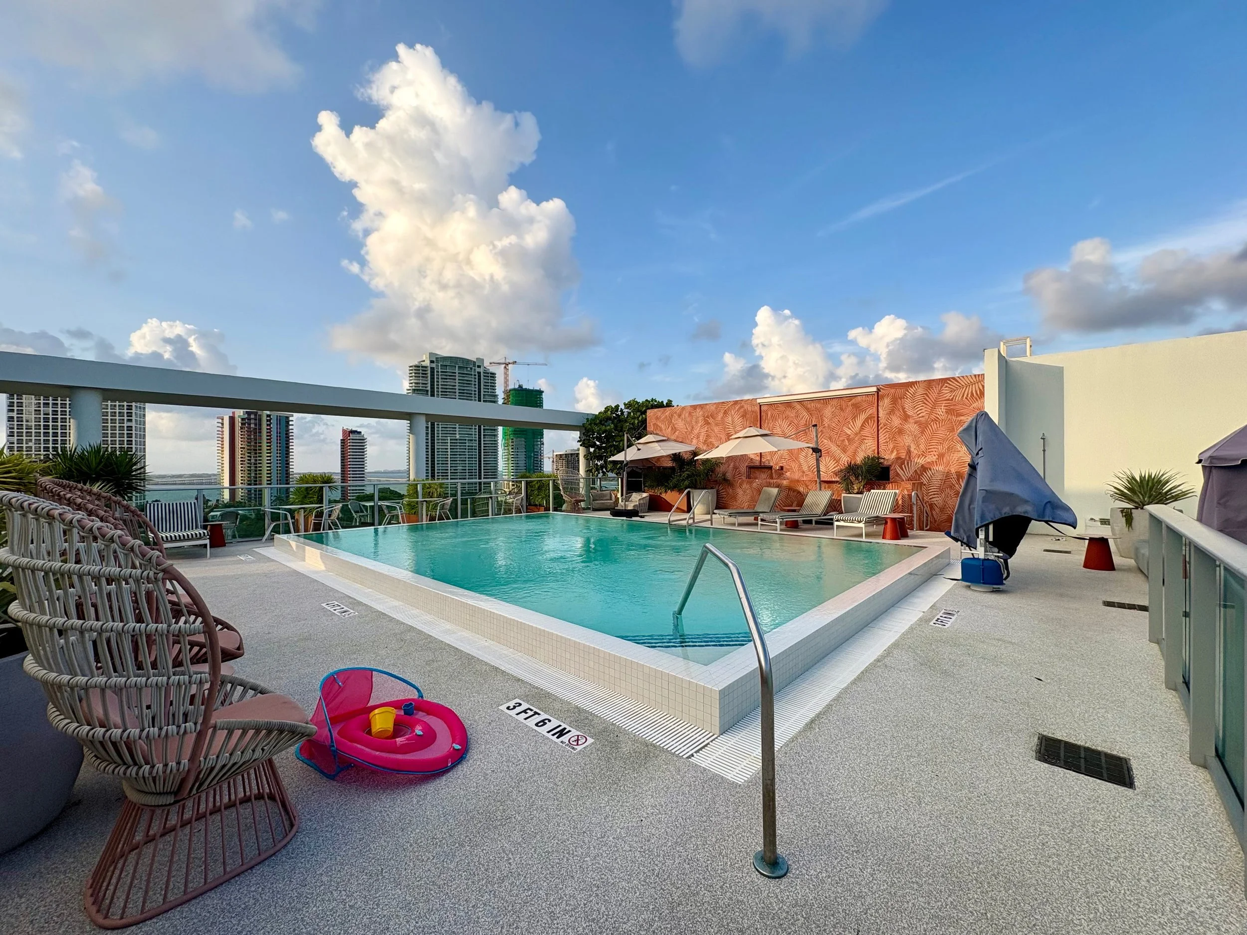 View of the rooftop pool at the Novotel Miami Brickell and Miami skyline