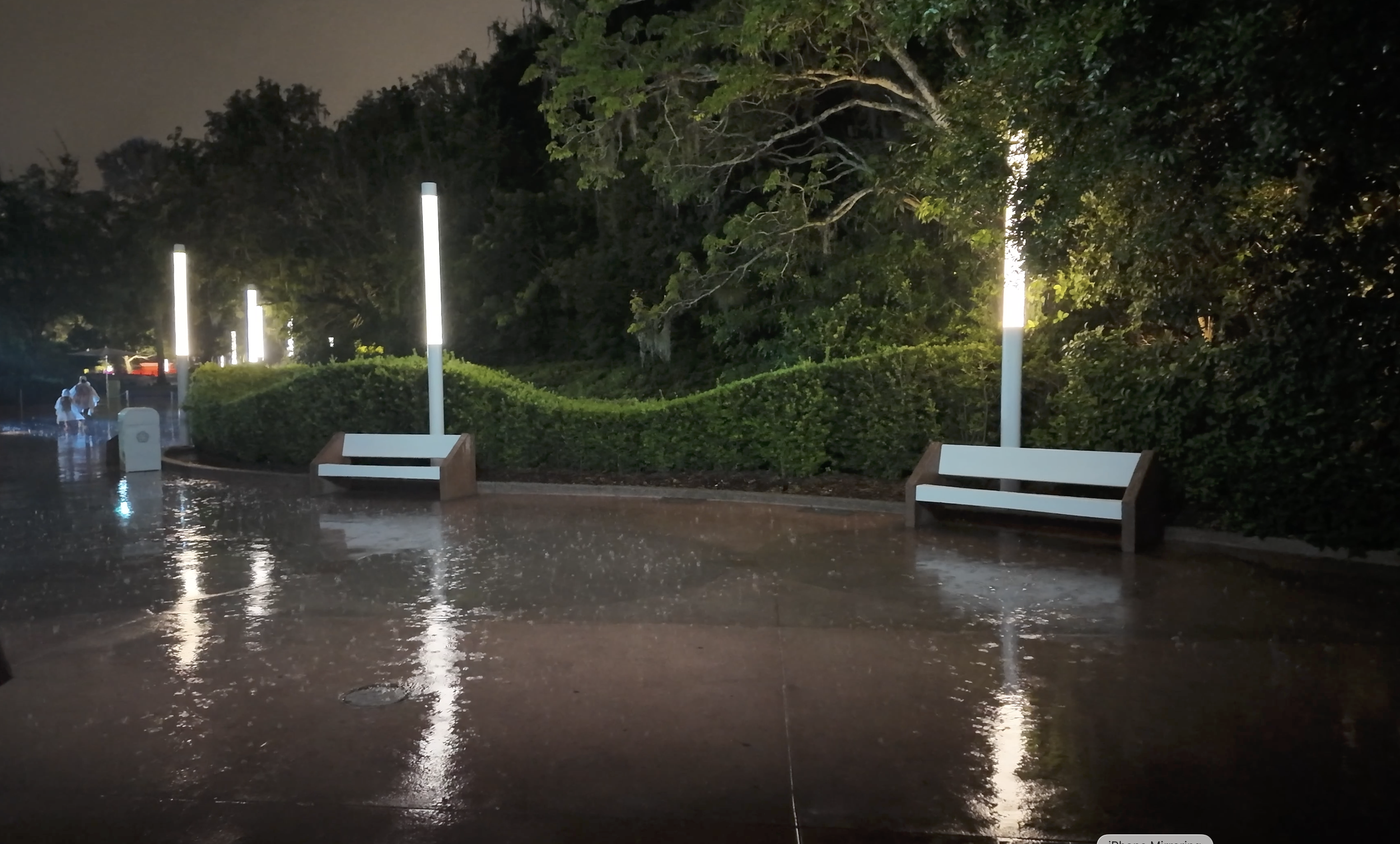 A picture showing the heavy Florida rain at Epcot during extended hours.