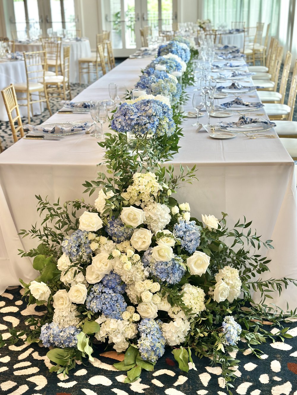 kara kolettis wedding elegant white and blue reception florals.jpeg