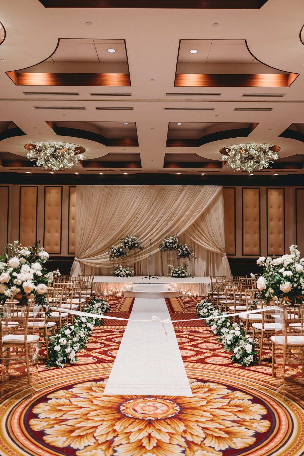 ali cerra wedding ceremony elegant white aisle florals.jpg