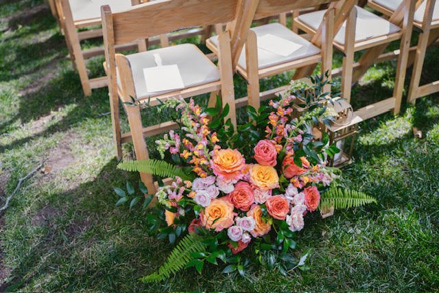 wedding aisle floral decor pink outdoor.jpg
