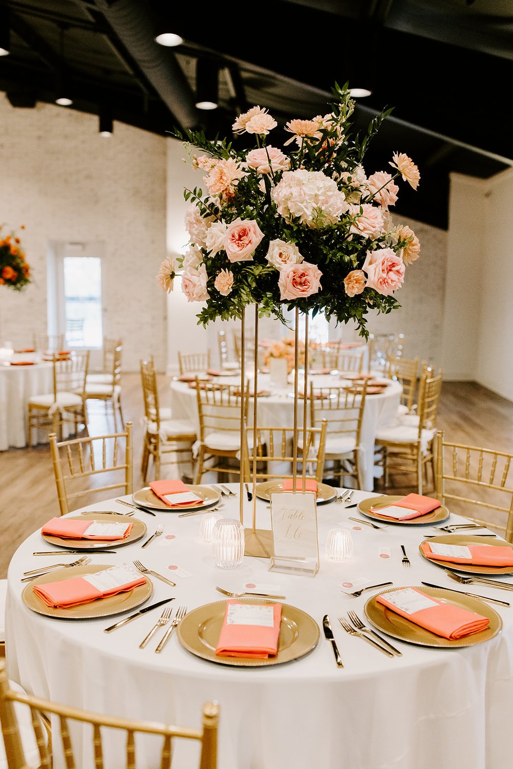 tall elegant pink wedding reception bouquet centerpieces.jpg