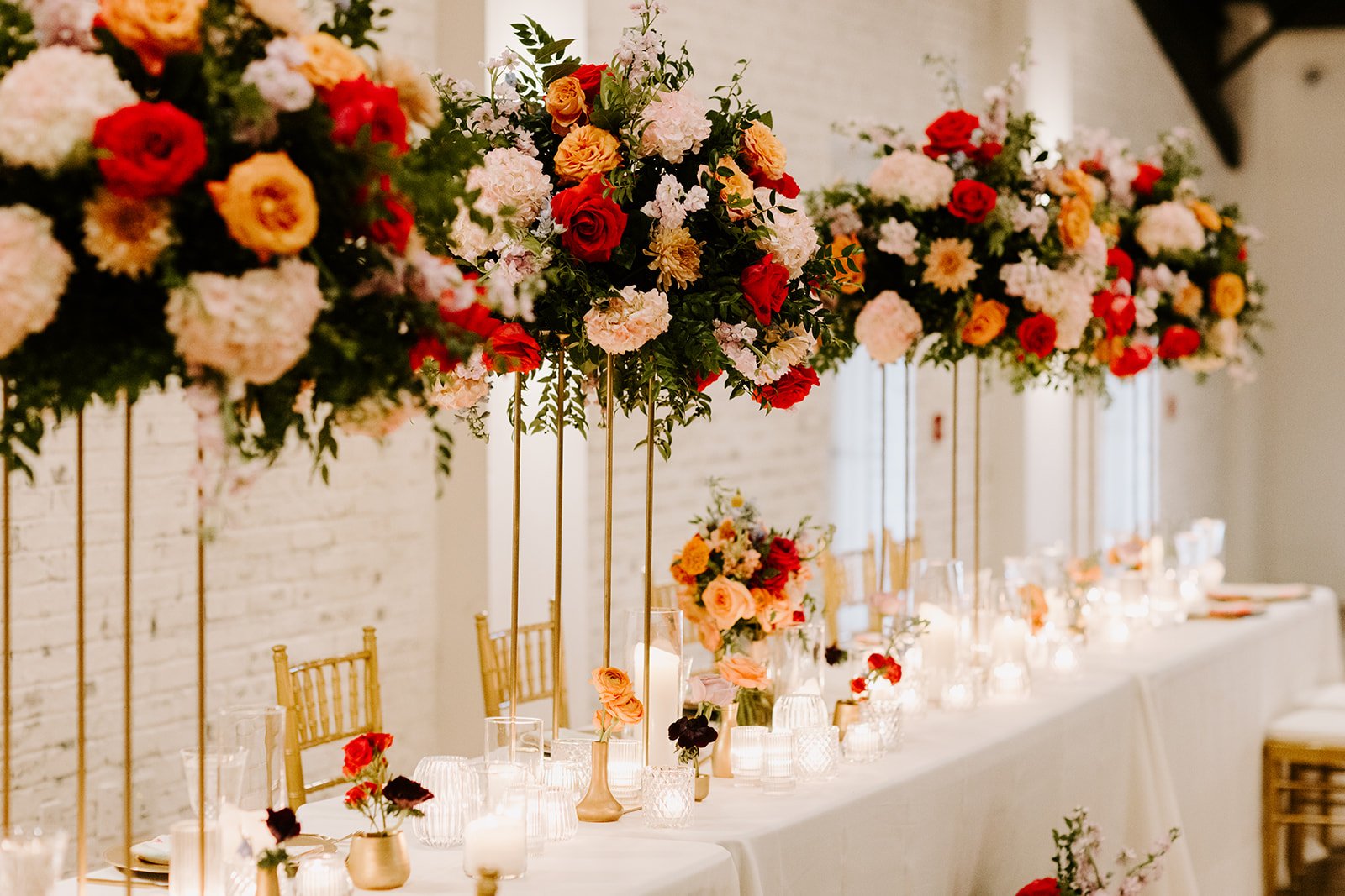 tall elegant wedding reception bouquet centerpieces.jpg