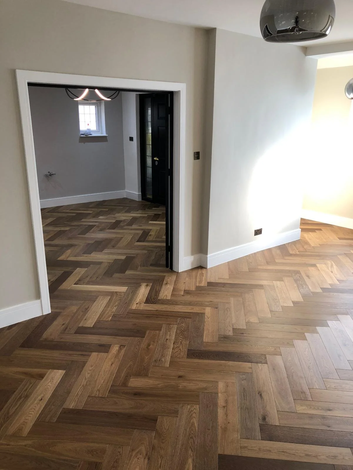 Herringbone oak parquet flooring installed in a Victorian home renovation in West London