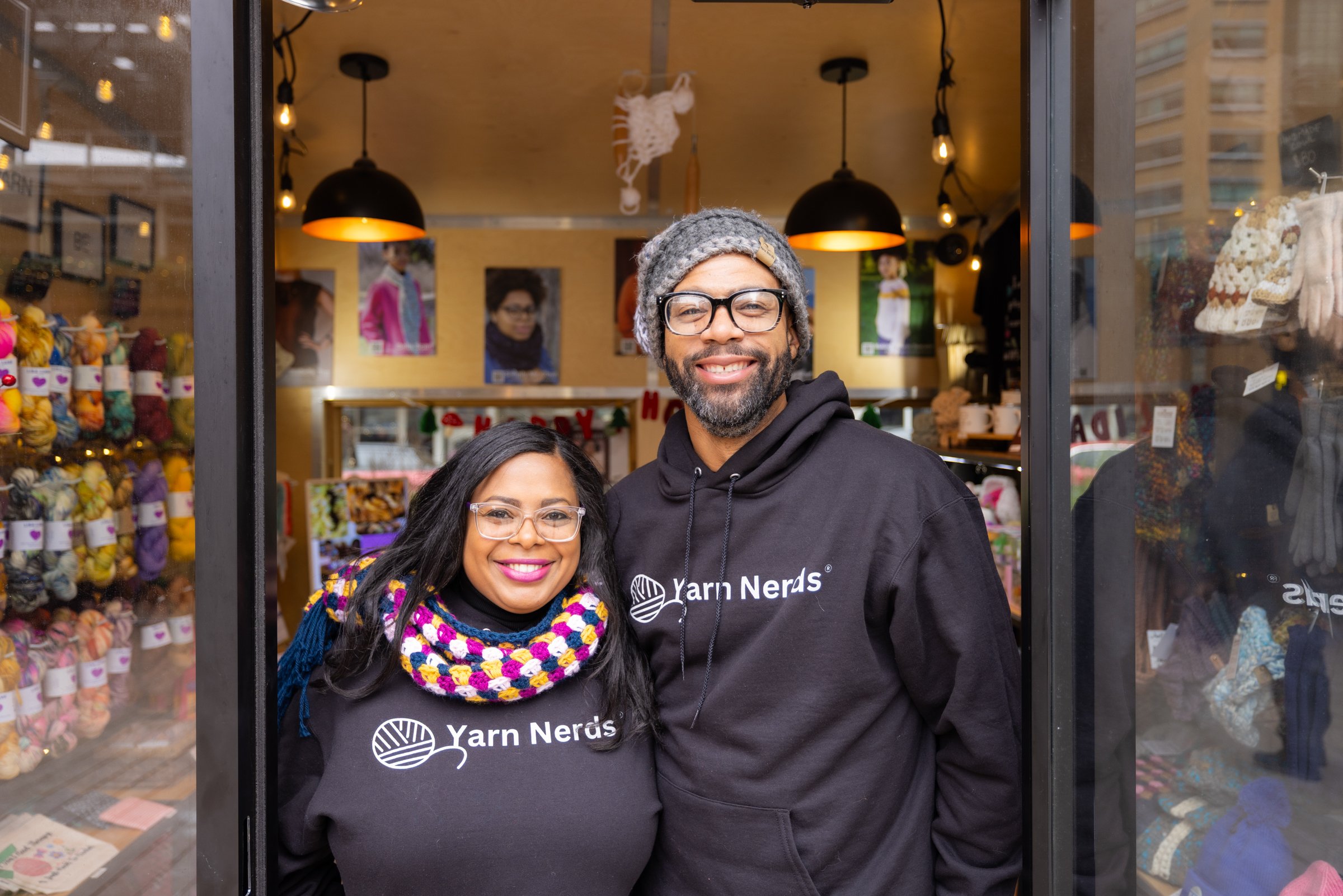 Exterior photo of the owners of Yarn Nerds at the Holiday Markets in Cadillac Square, downtown Detroit.