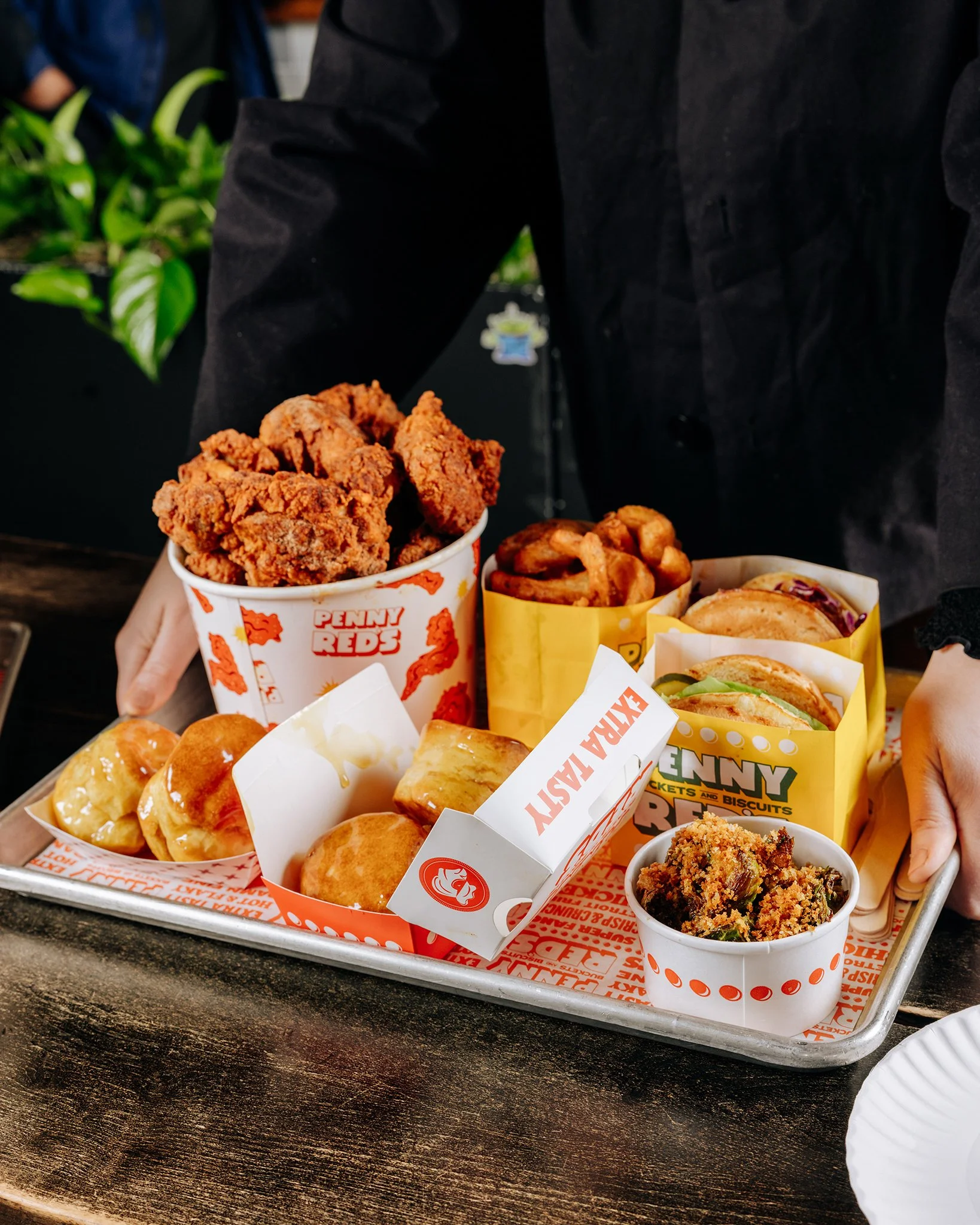 Two women entering Penny Reds at Parker's Alley in Detroit.