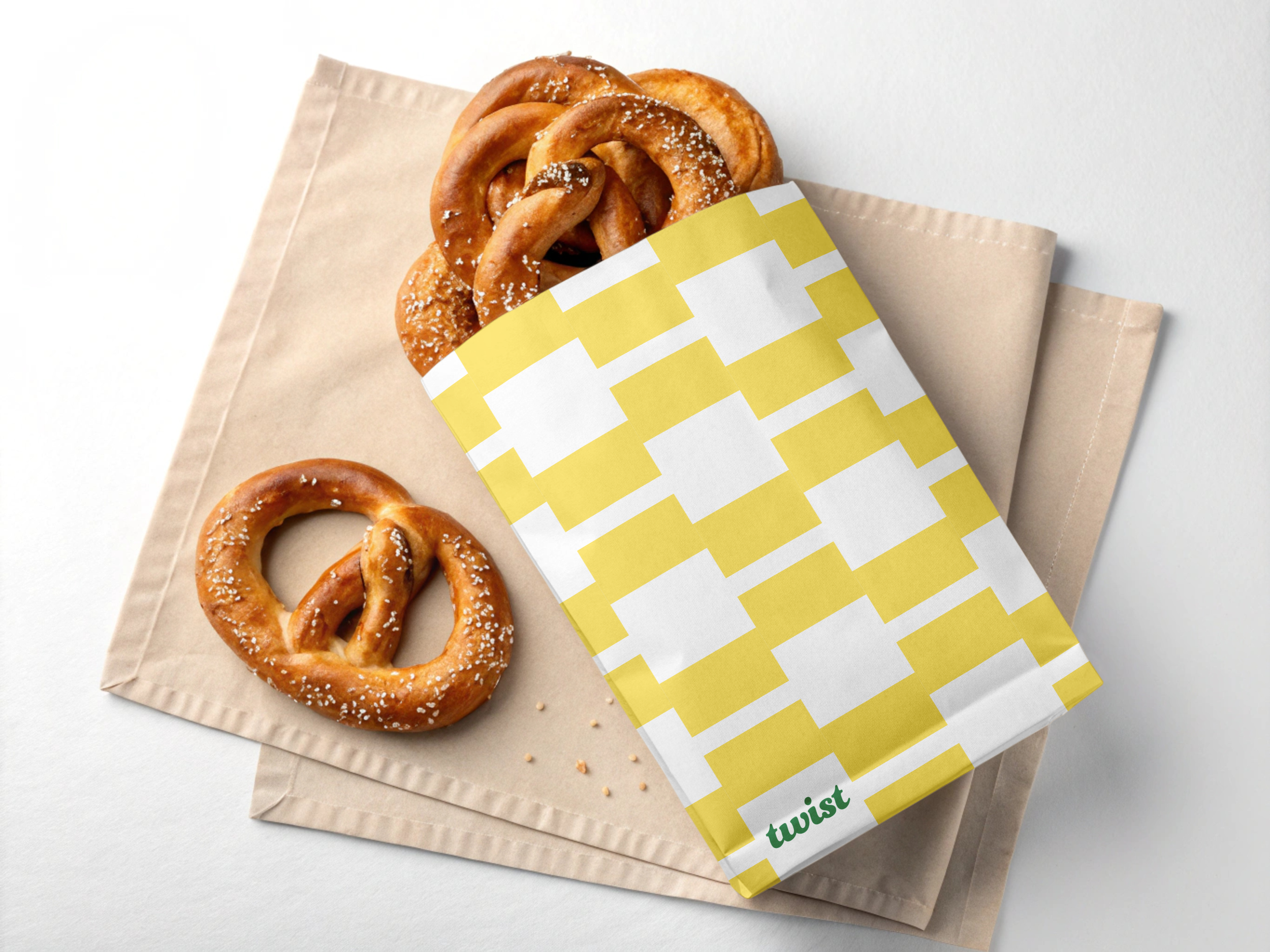 Mockup of a pretzel product from Twist Bar with branded packaging.