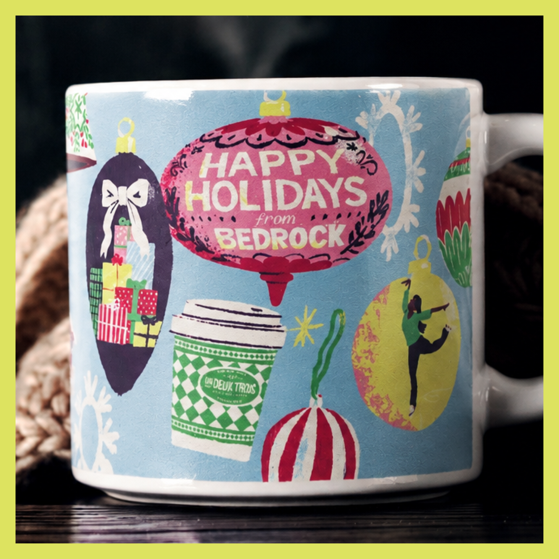 The 2026 holiday mug, which says, "Happy Holidays from Bedrock."