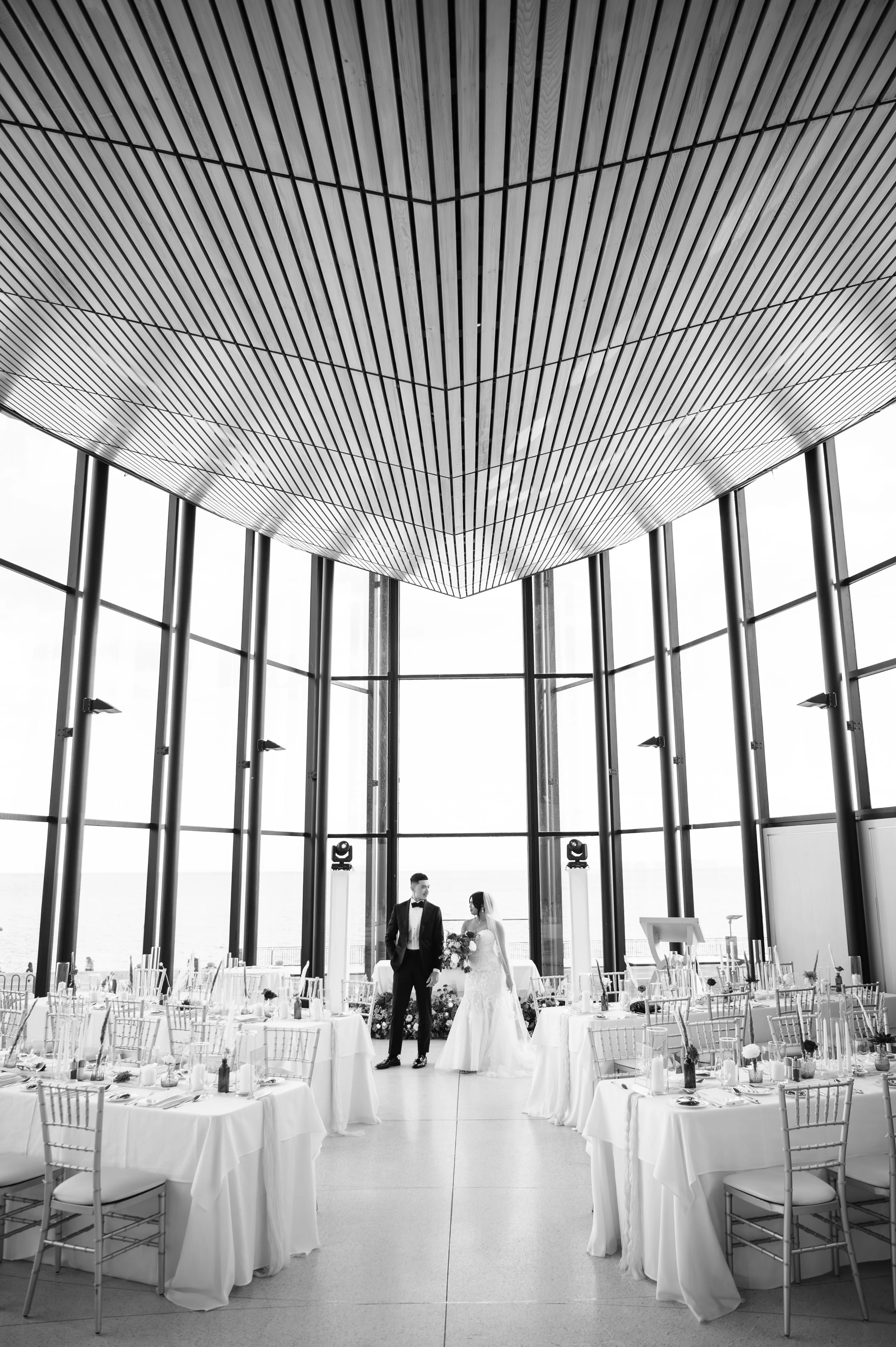 Black-and-white photo of a beautifully set reception space at Spencer's at the Waterfront Burlington Ontario