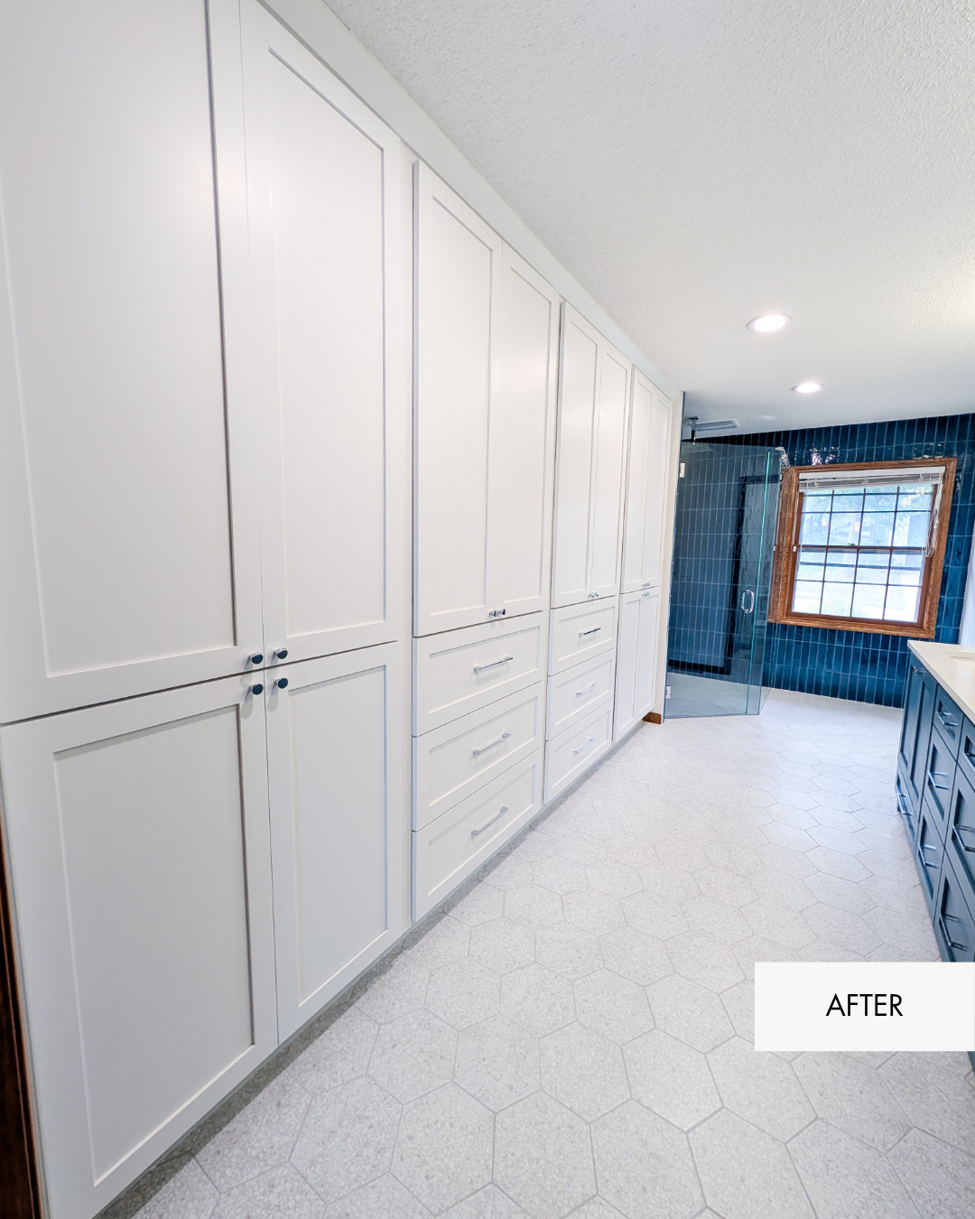 Remodeled primary closet with organized floor-to-ceiling storage that makes better use of the available space