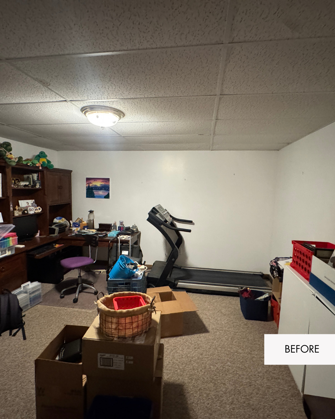 Dark basement office before remodel in Grain Valley Missouri with drop ceiling and old lighting