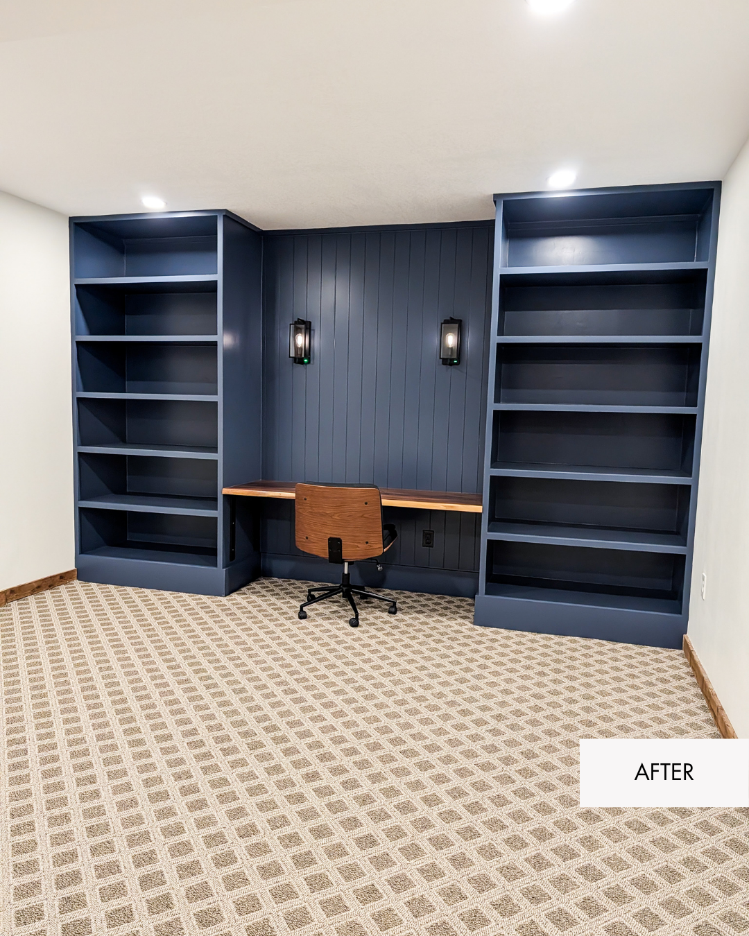 Basement office remodel in Grain Valley Missouri with blue built-in cabinetry and wall sconces