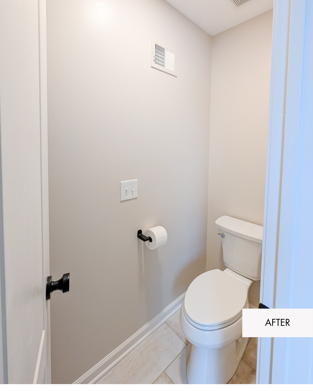After photo of updated water closet with neutral walls and black hardware