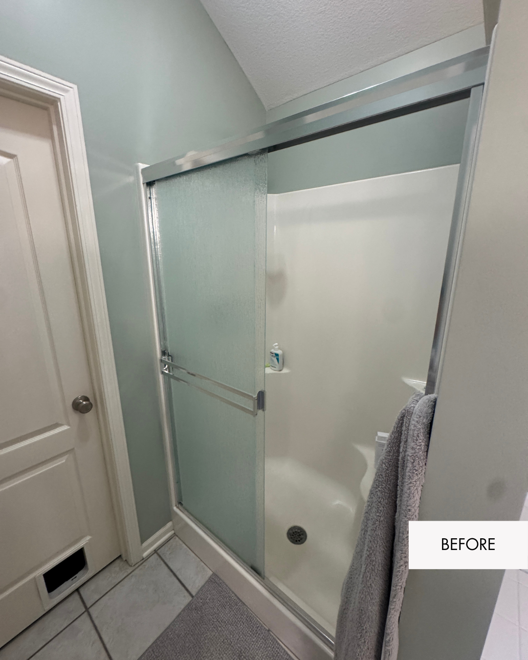 Before photo of old framed shower in primary bathroom