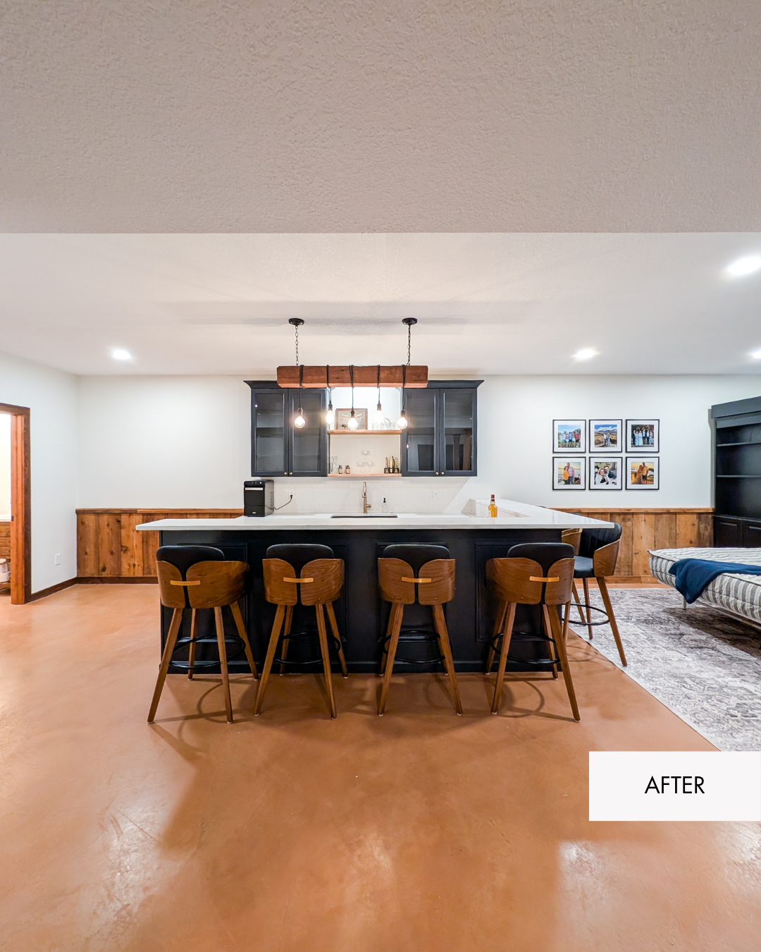Custom black basement kitchenette bar with box trim in modern cabin remodel in Grain Valley Missouri