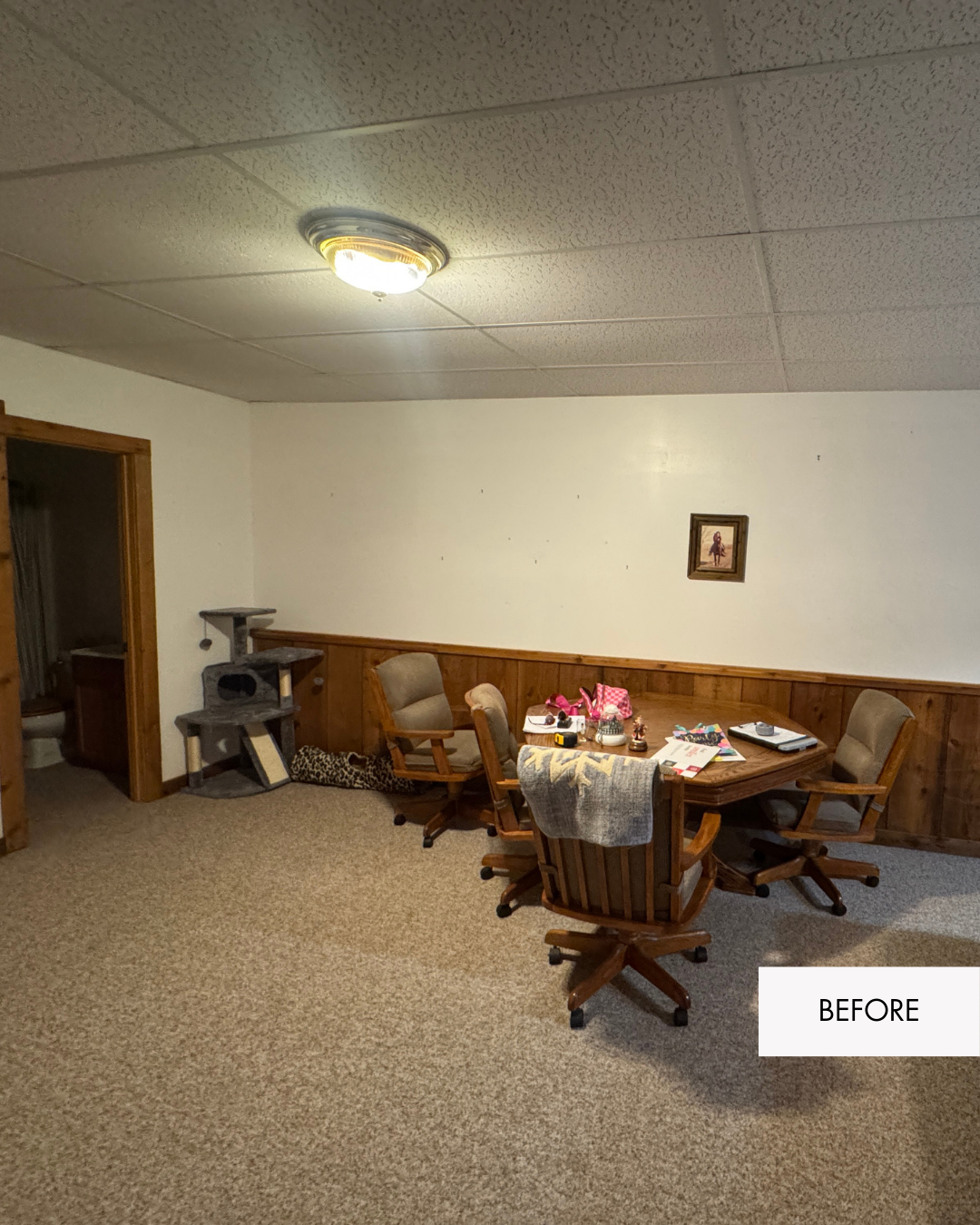 Basement entertaining space before remodel in Grain Valley MO with drop ceiling and outdated lighting