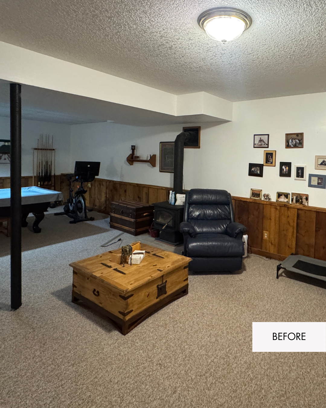 Unfinished log cabin basement before remodel in Grain Valley Missouri with drop ceiling and open layout