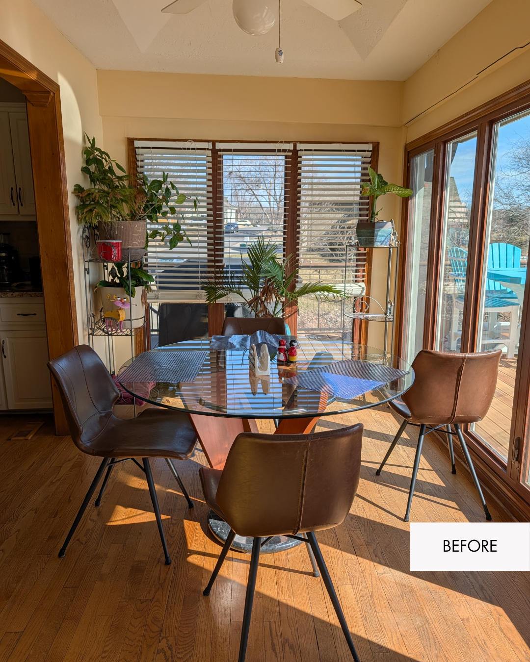 Lee's Summit sunroom before refresh with dated paint, older lighting and drywall areas needing repair