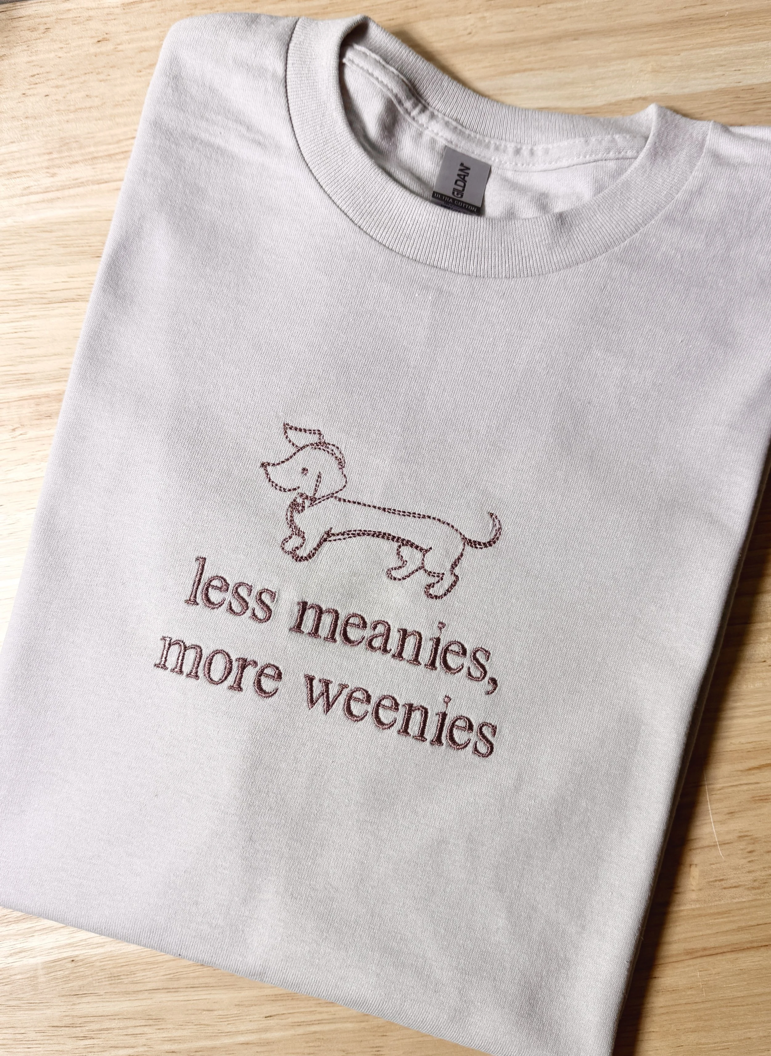 Less Meanies, More Weenies Embroidered T-Shirt