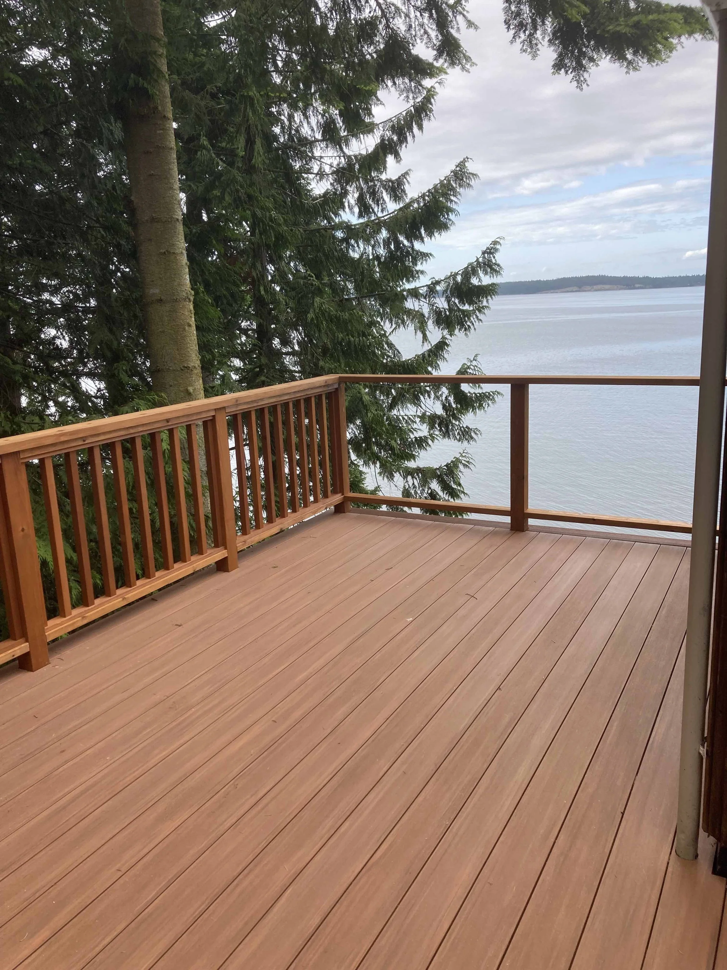 Custom composite and cedar deck and railing in Port Ludlow, WA