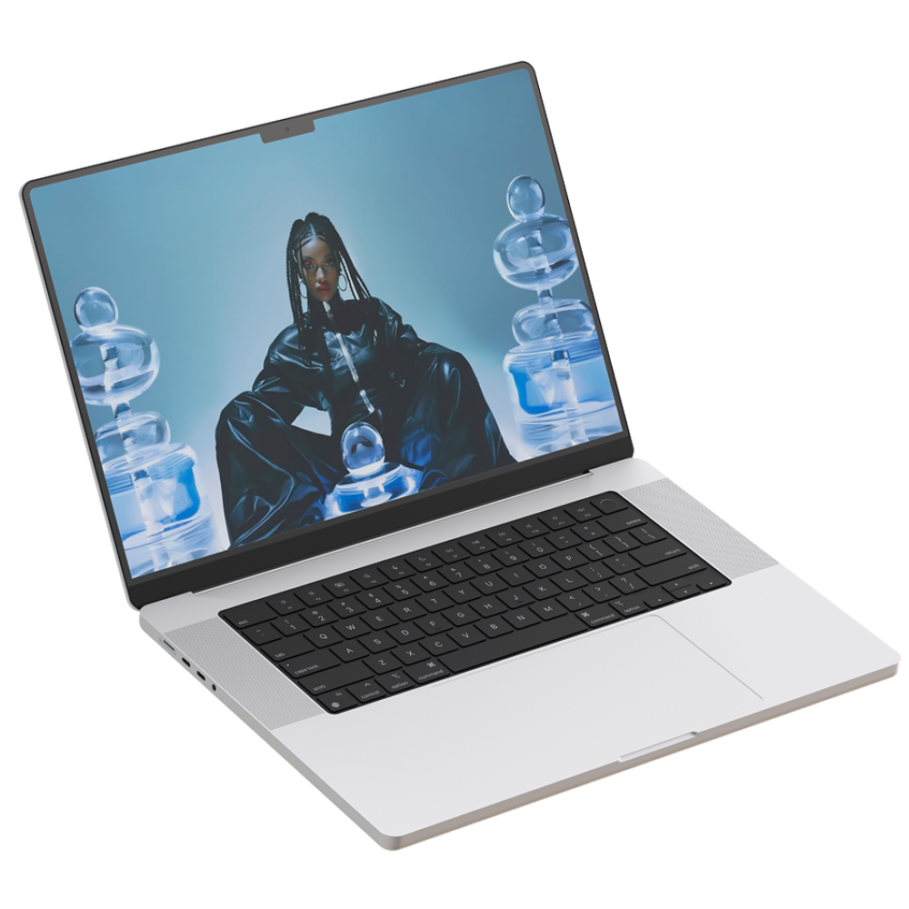 Open laptop displaying an image of a woman in black leather outfit surrounded by glass sculptures.