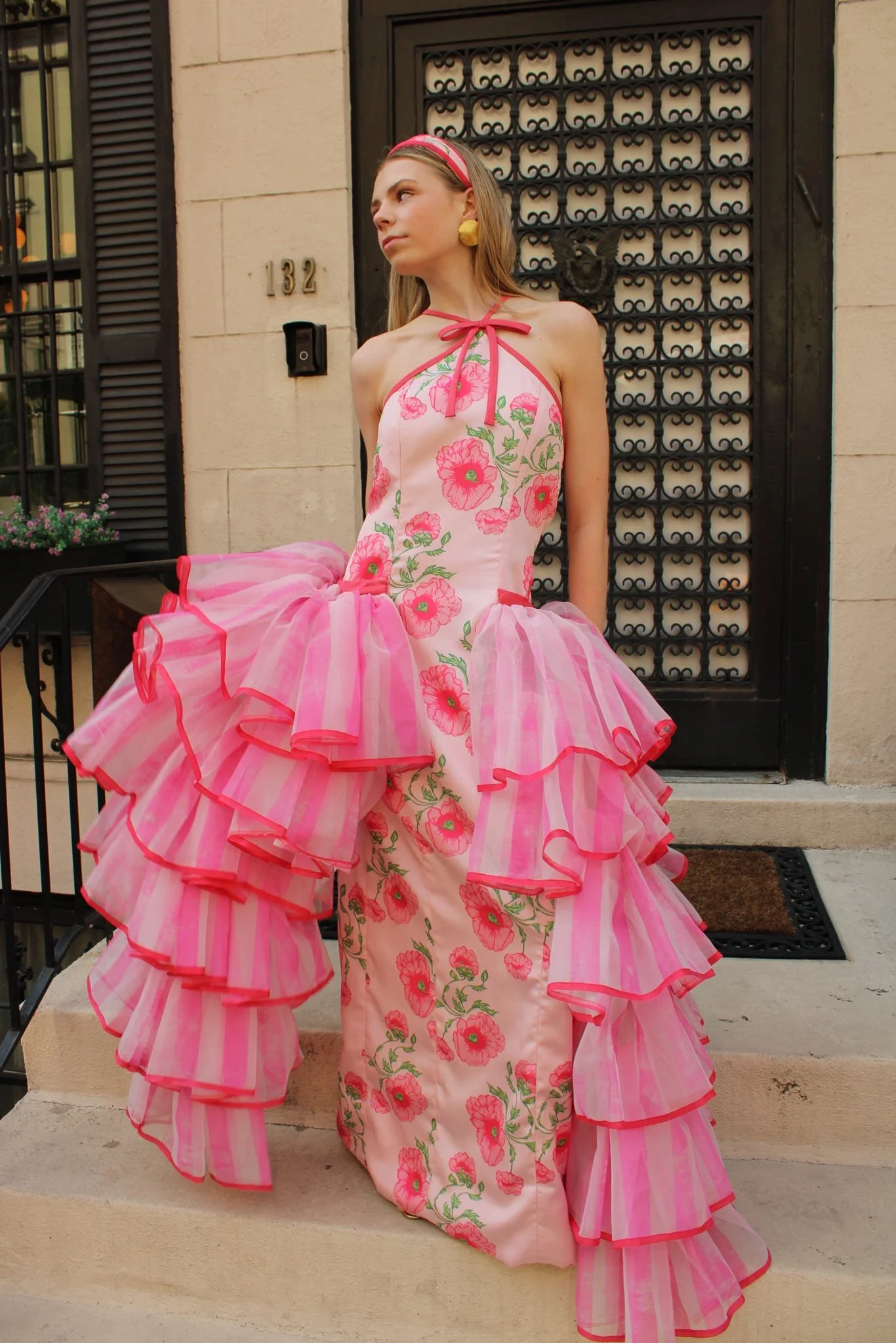 The organza ruffles give the dress the perfect silhouette.