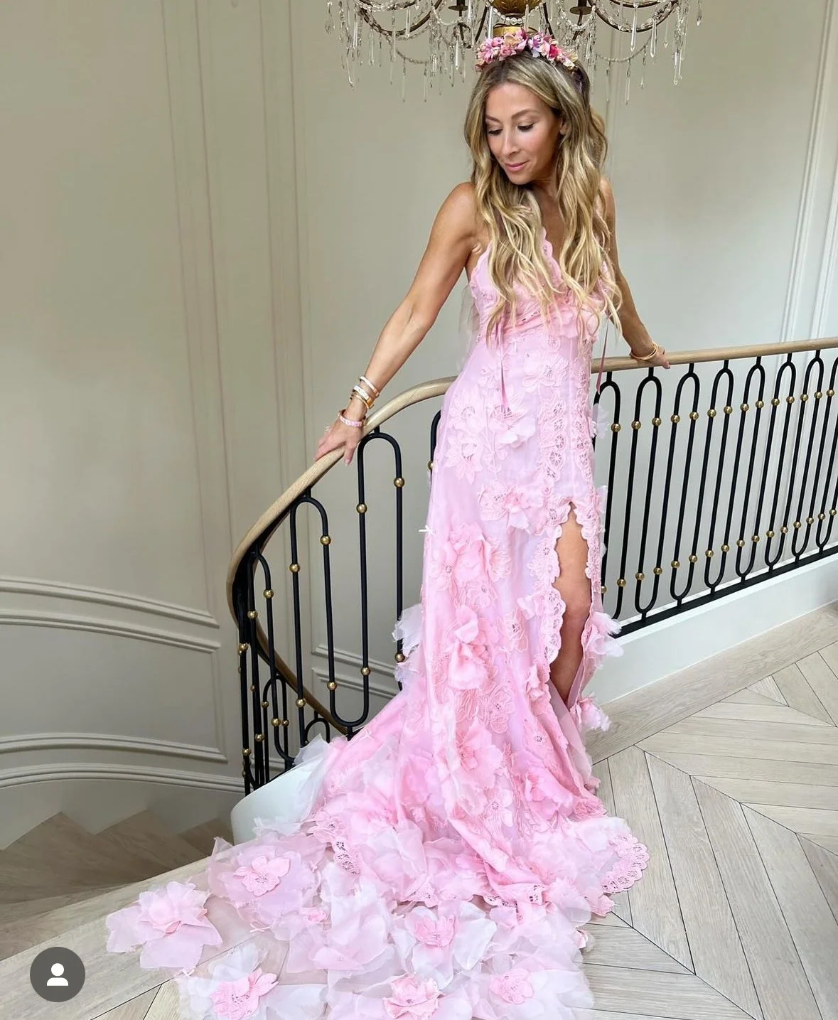The founder wearing the dress where I created and sewed the flowers.