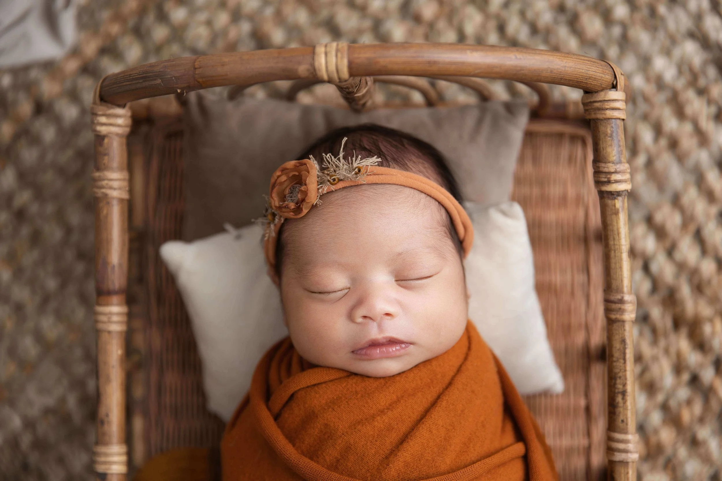Professionally posed newborn baby photo taken by a Frisco TX newborn photographer