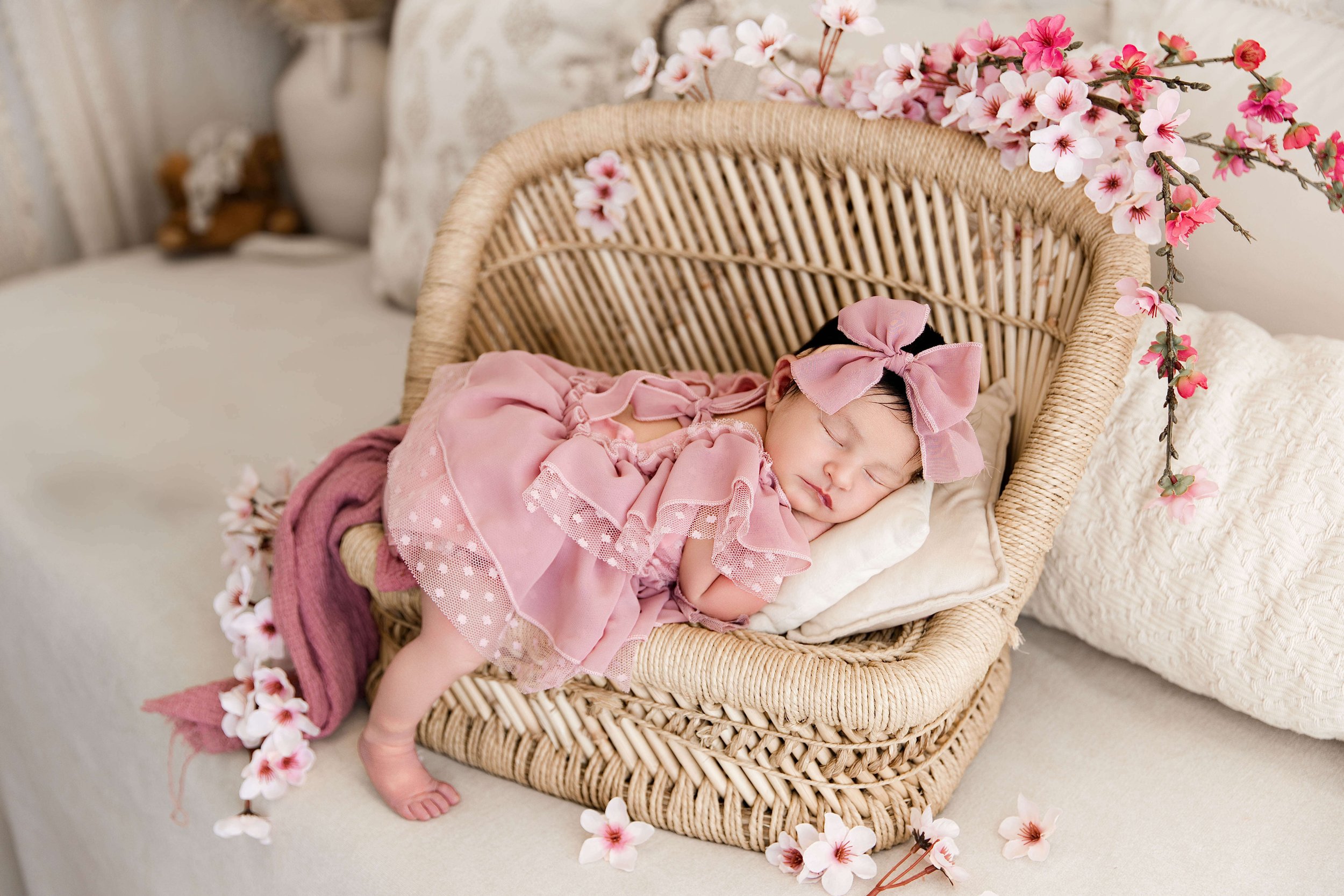 baby on wicker bed